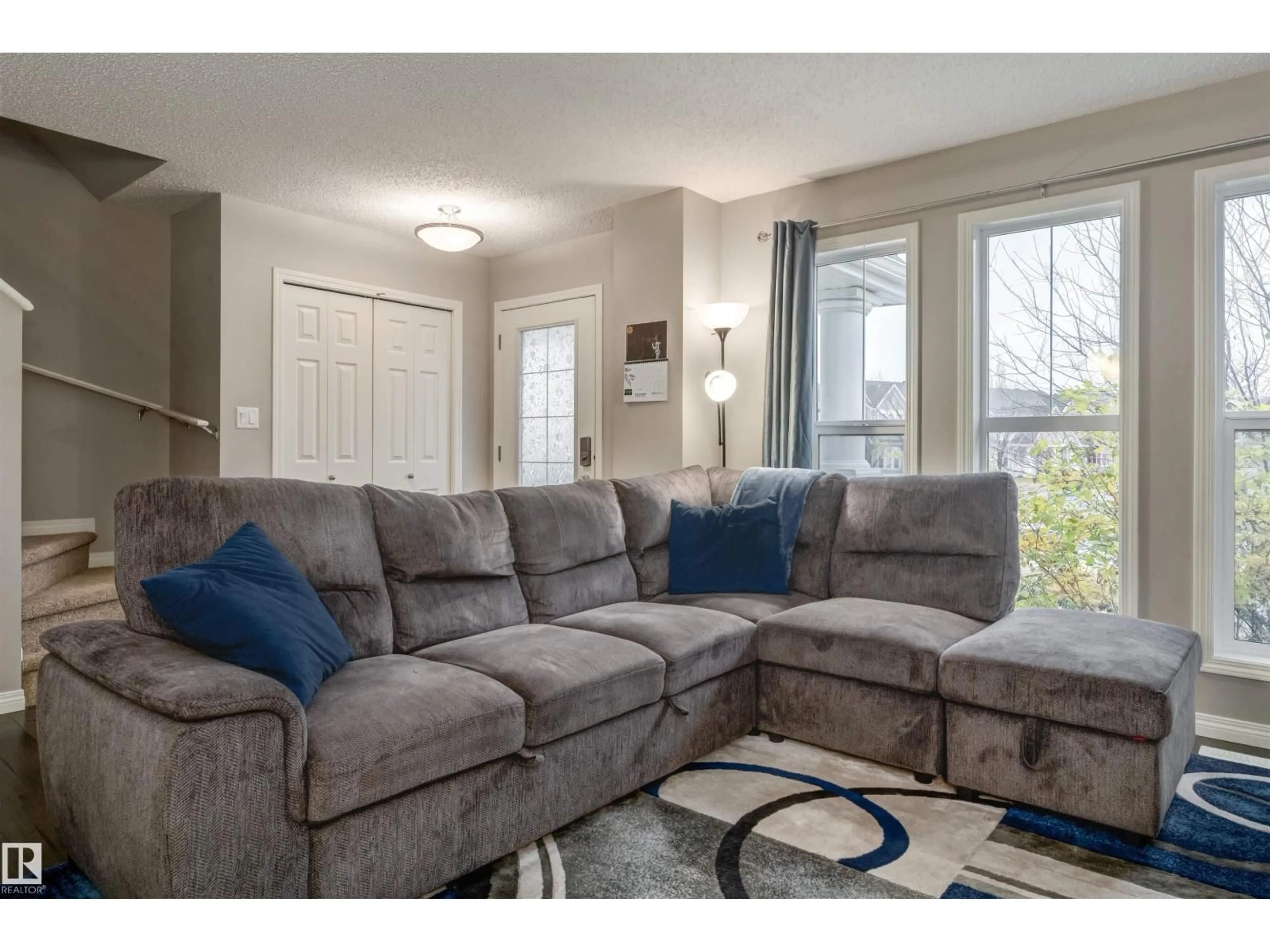 Living room with furniture, unknown for SW - 7123 22 AV, Edmonton Alberta T6X0S4