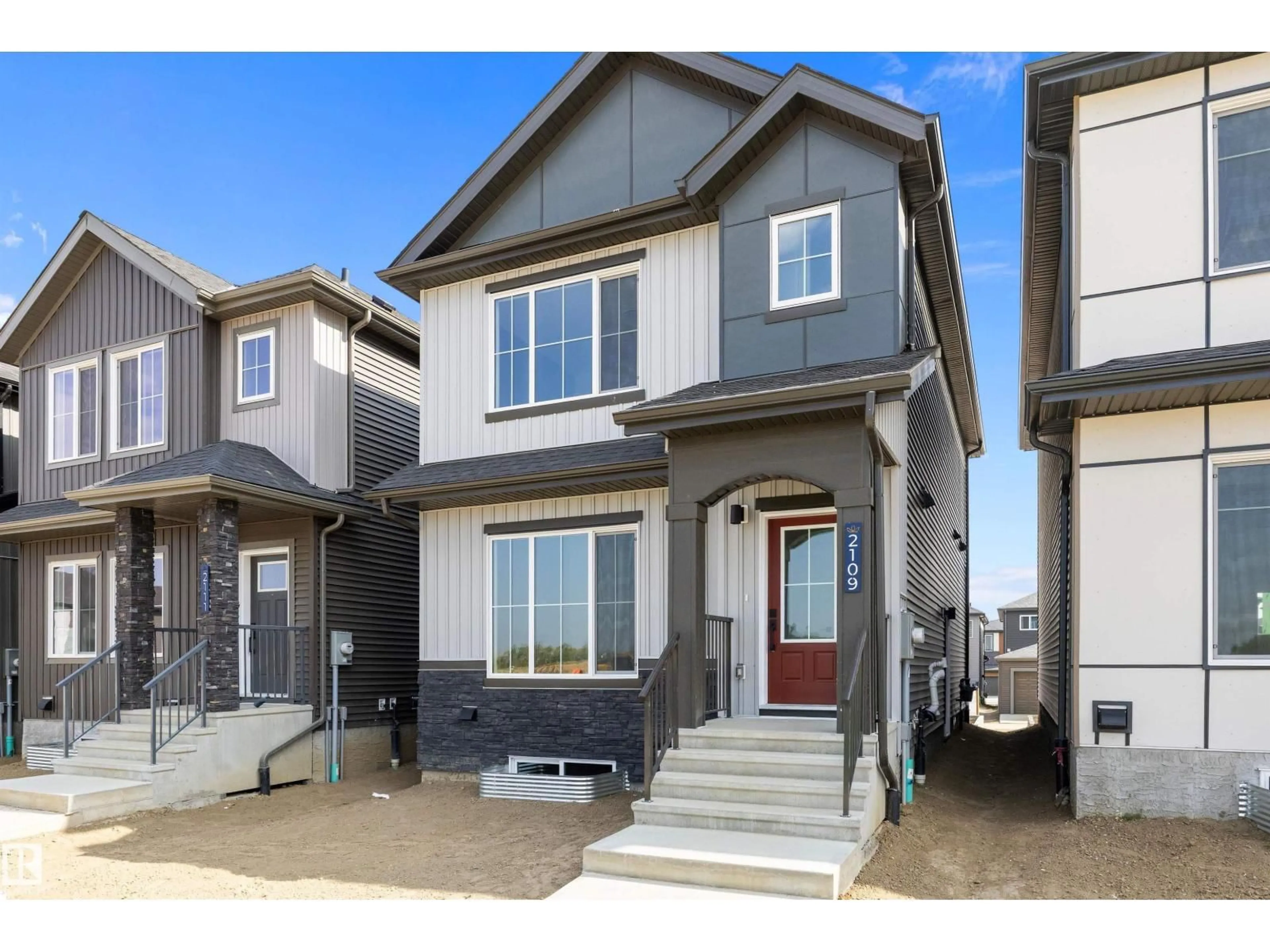 Home with vinyl exterior material, street for 2109 CROSSBILL LN, Edmonton Alberta T5S0W3
