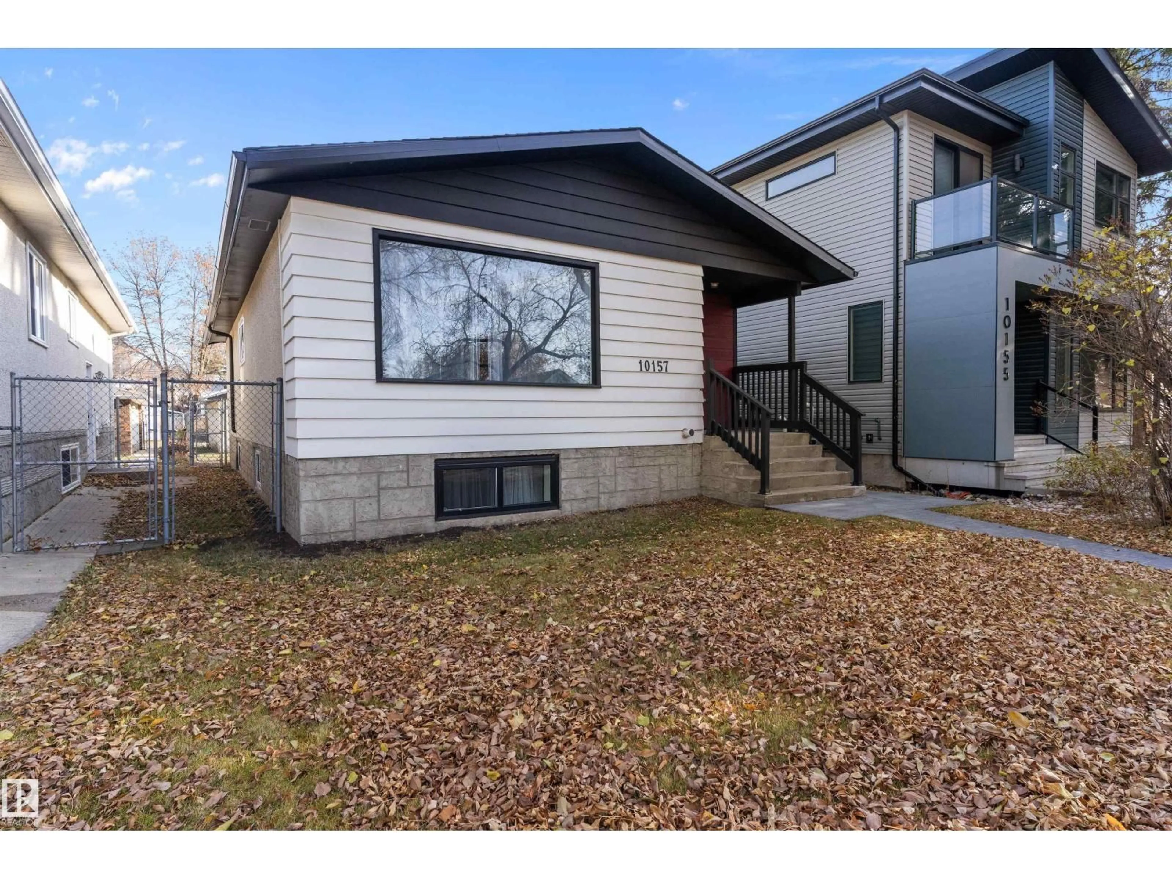Home with vinyl exterior material, street for 10157 145 ST, Edmonton Alberta T5N2X6