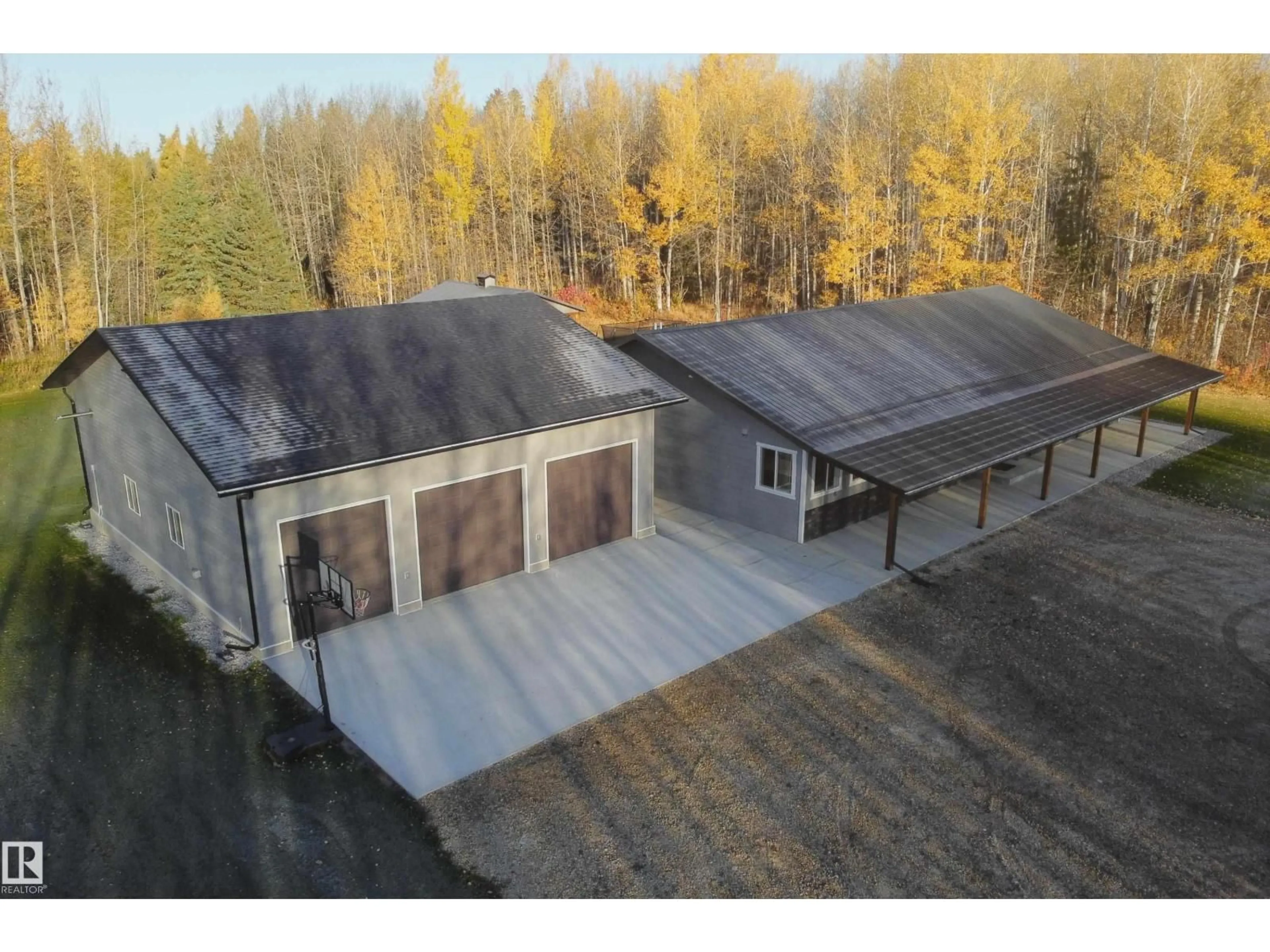 A pic from outside/outdoor area/front of a property/back of a property/a pic from drone, building for 60432 RGE RD 64, Rural Barrhead County Alberta T7N1N3