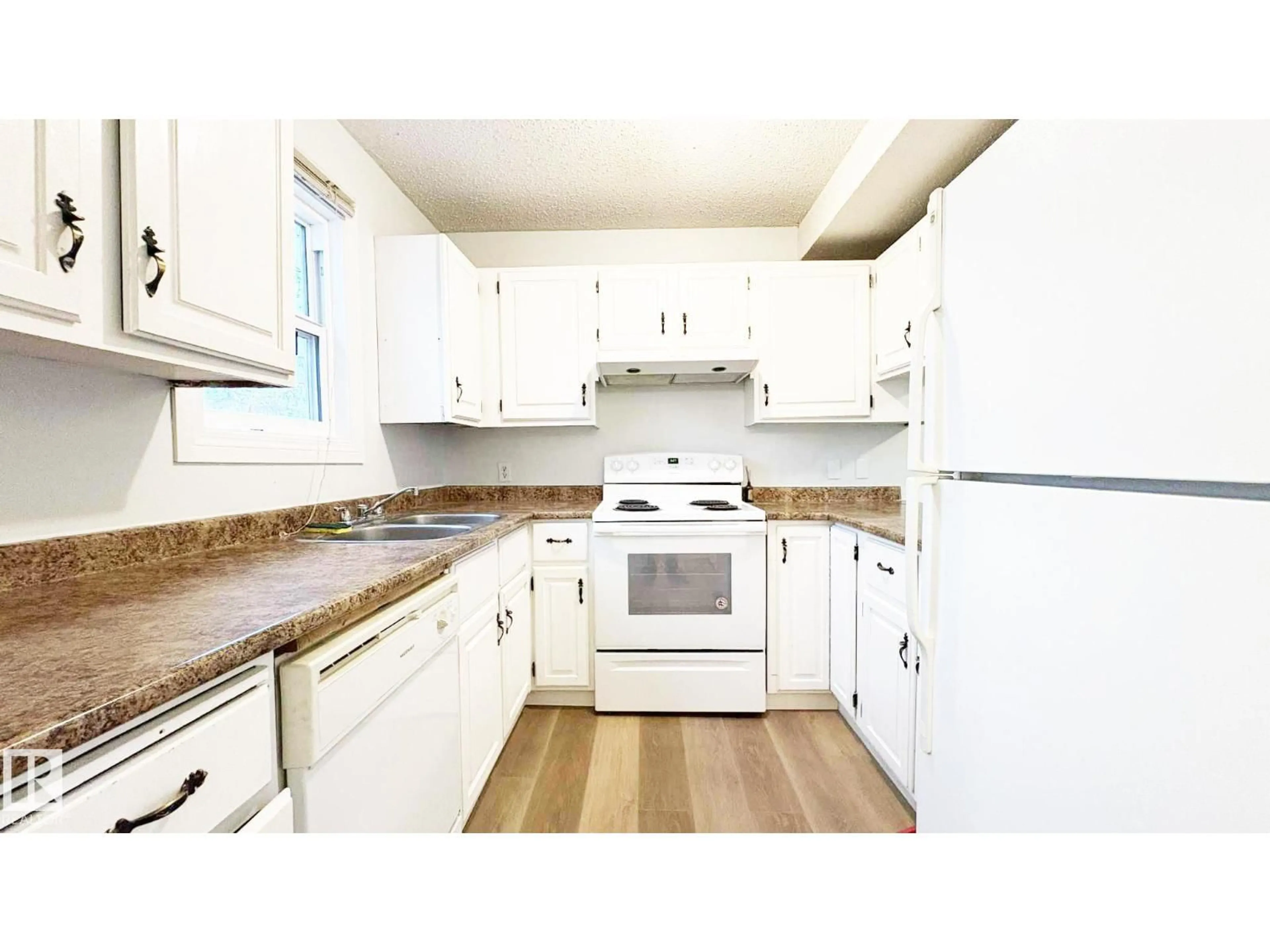 Standard kitchen, wood/laminate floor for 10427 24 AV, Edmonton Alberta T6J4S2