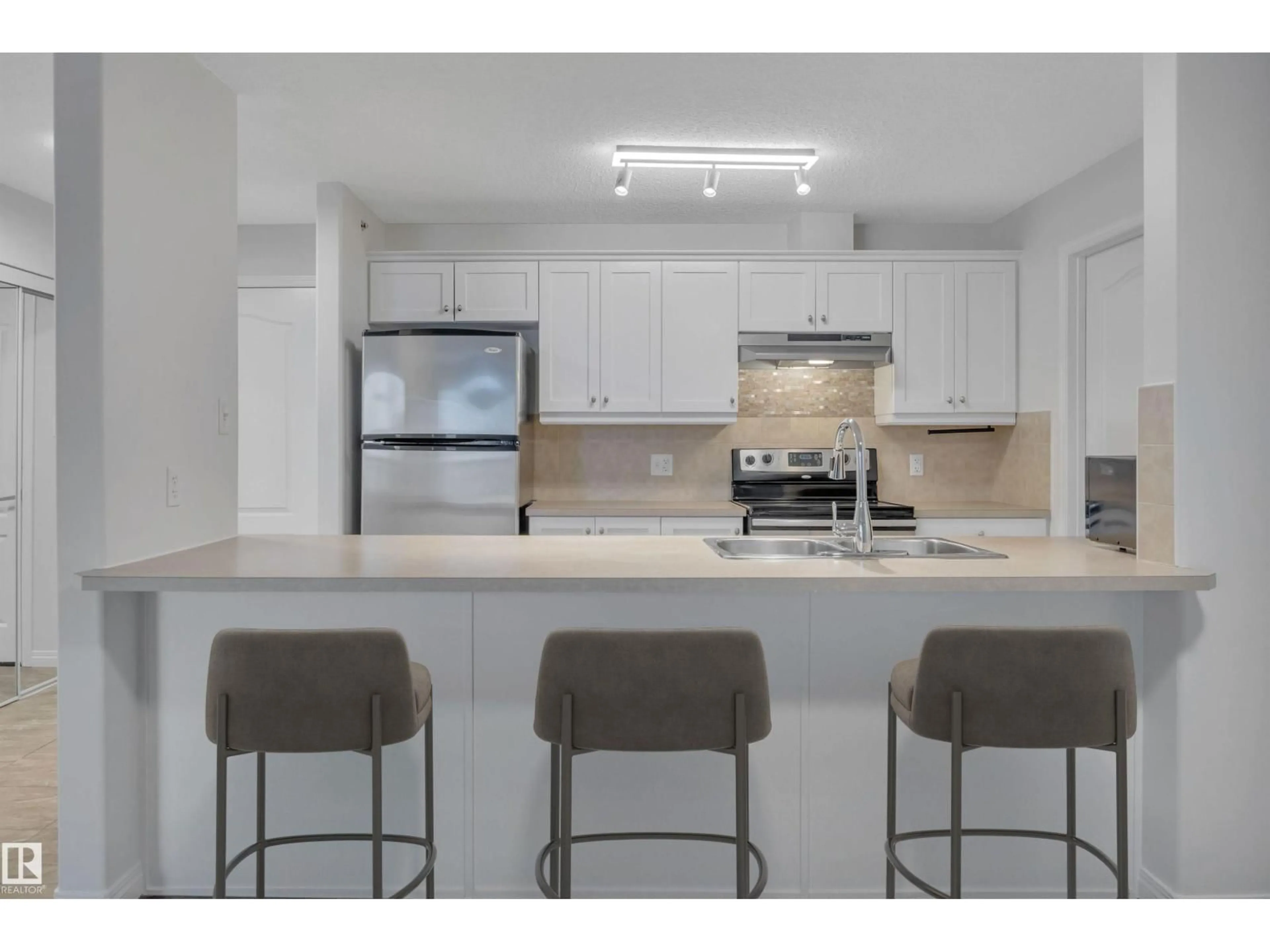 Open concept kitchen, ceramic/tile floor for 9363 - 1431 SIMSON DR, Edmonton Alberta T6N0N2