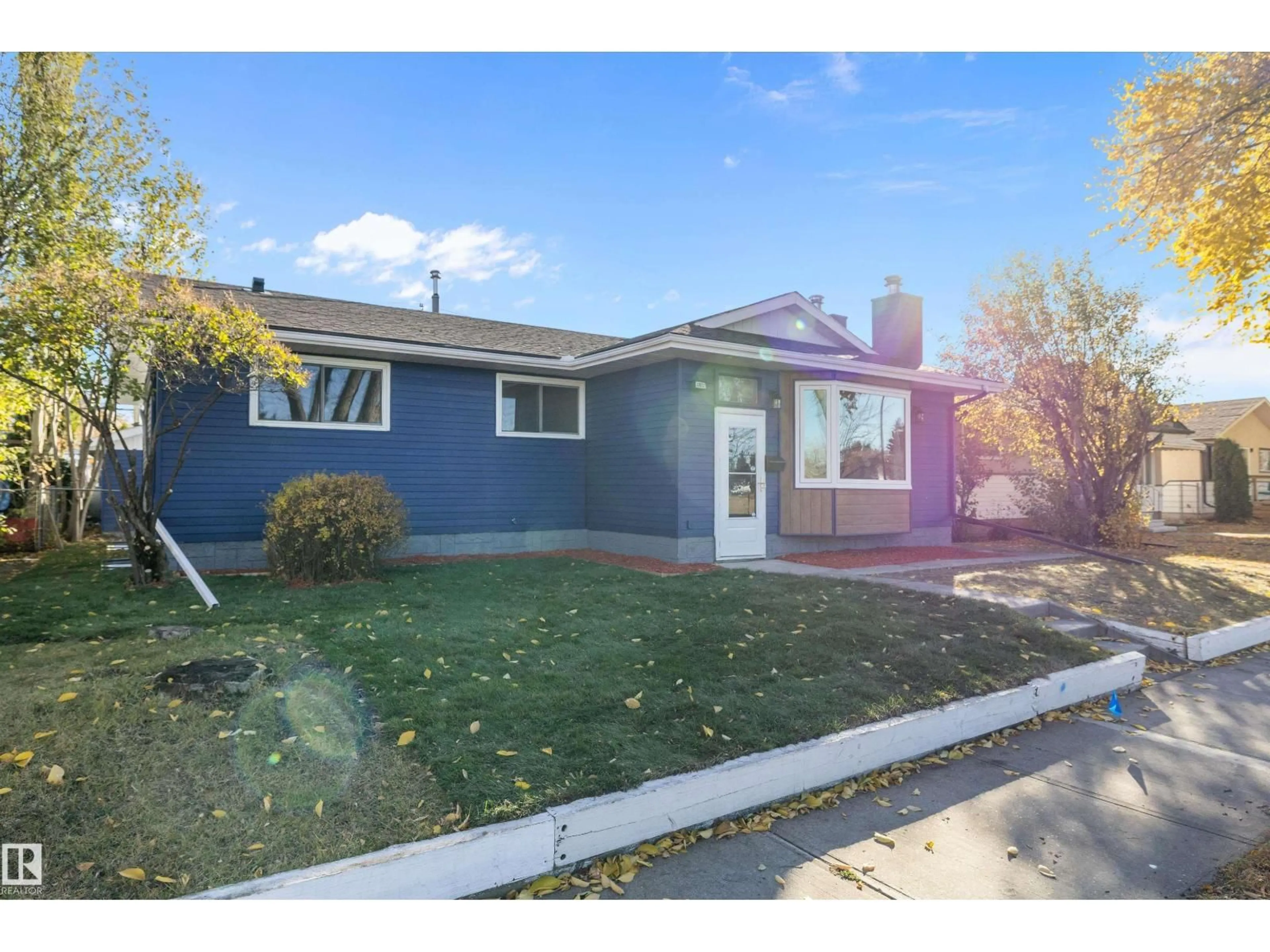 Home with vinyl exterior material, street for NW - 11031 153A ST, Edmonton Alberta T5P2E7