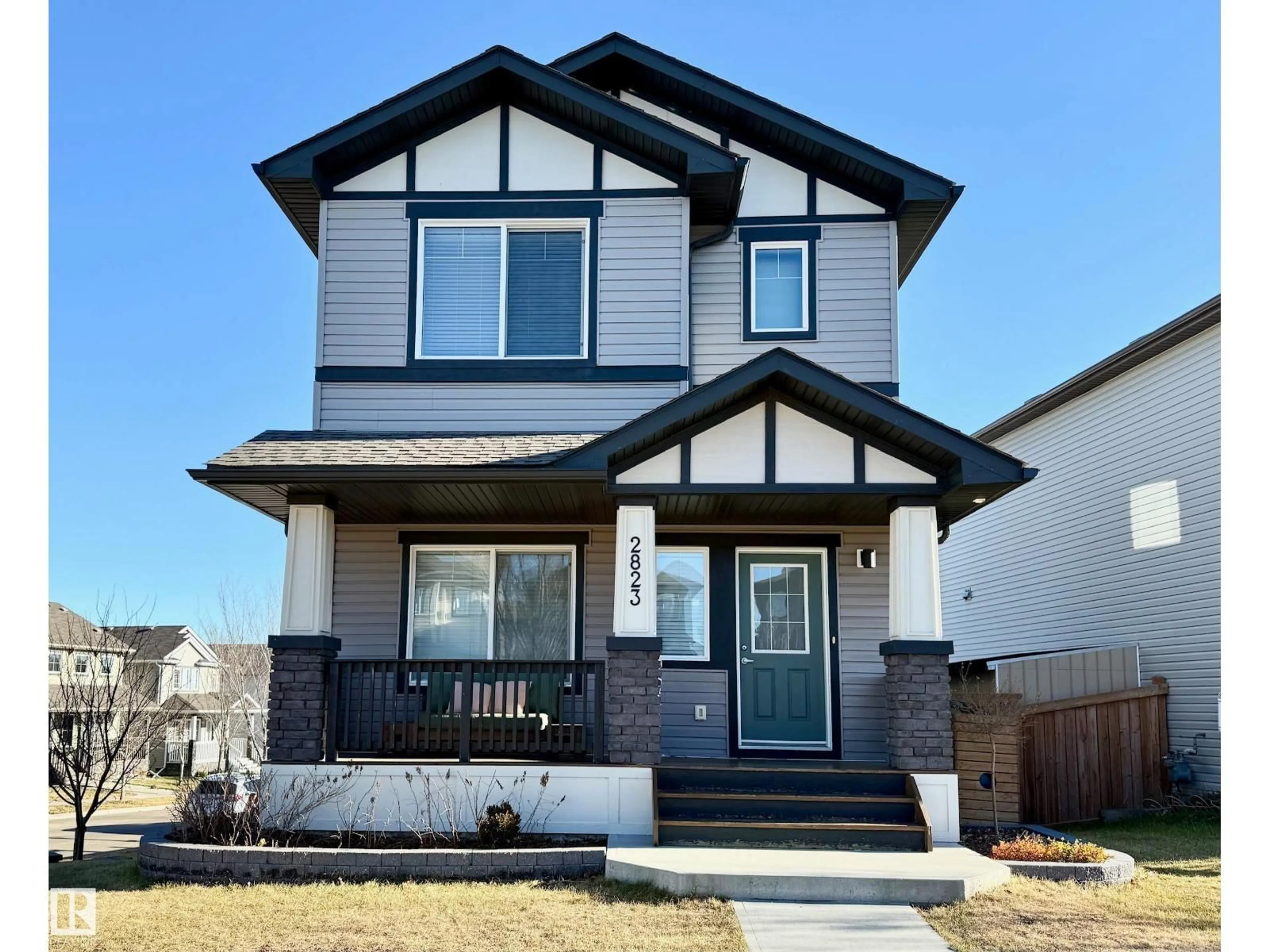 Home with vinyl exterior material, street for NW - 2823 12 ST, Edmonton Alberta T6T0V8