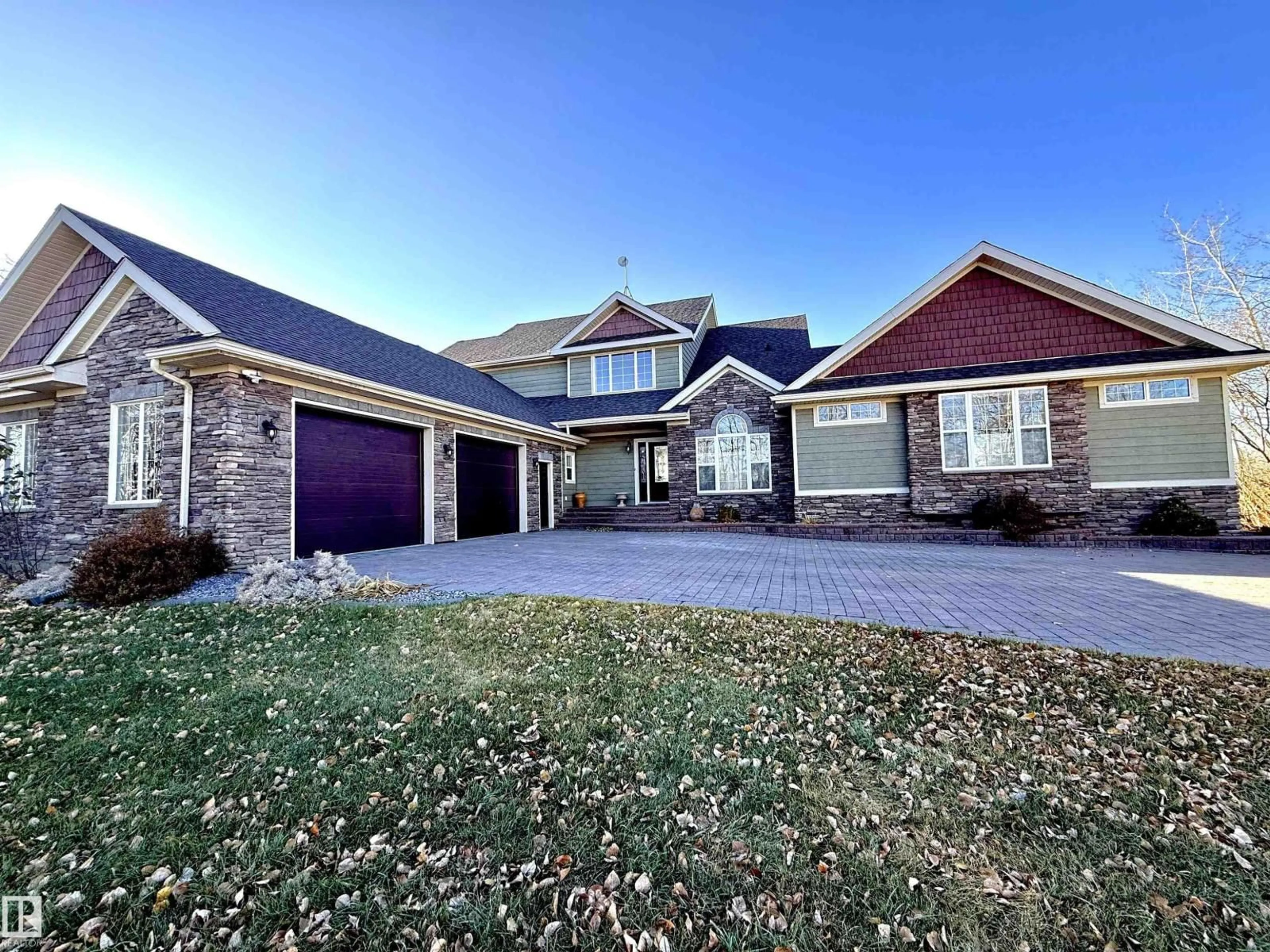 Home with brick exterior material, street for 50344 RGE RD 243, Rural Leduc County Alberta T4X0N5