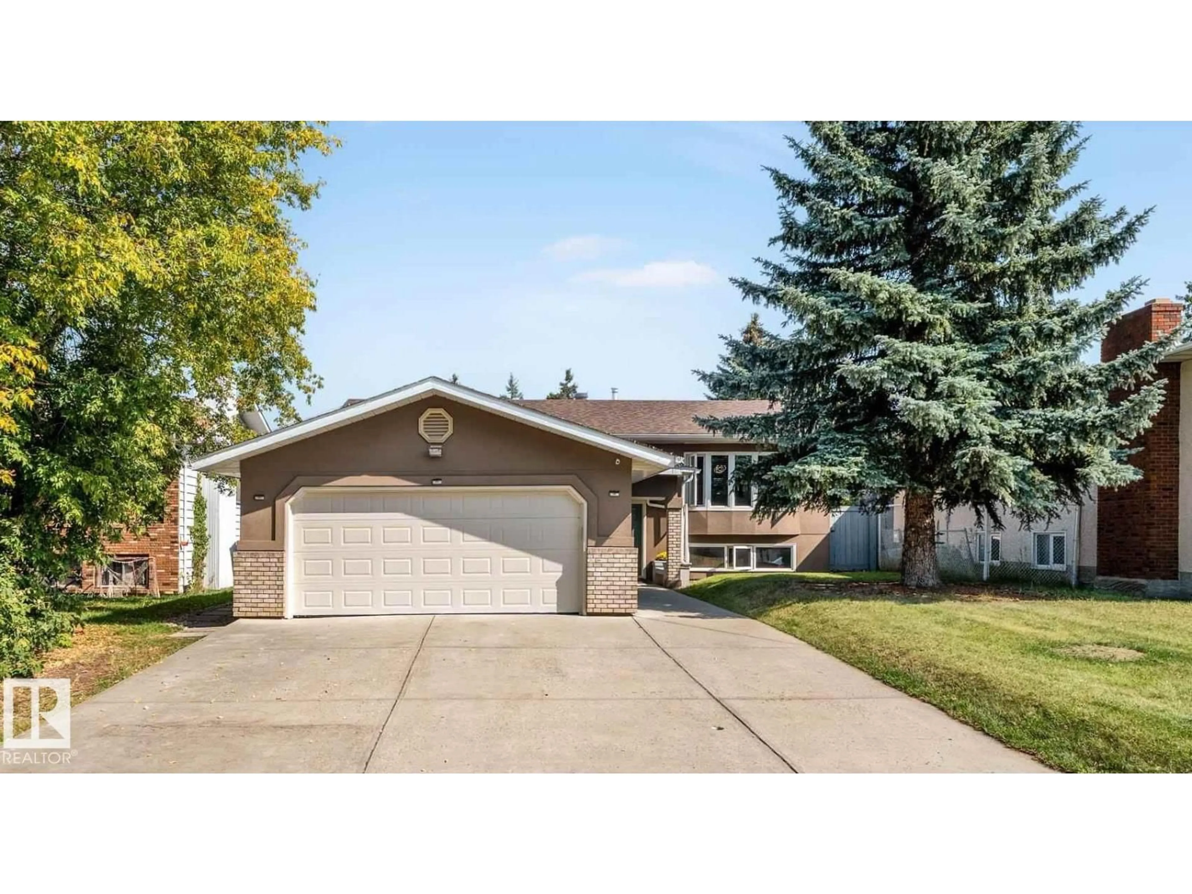 Home with vinyl exterior material, street for NW - 3923 67 ST, Edmonton Alberta T6K2N7