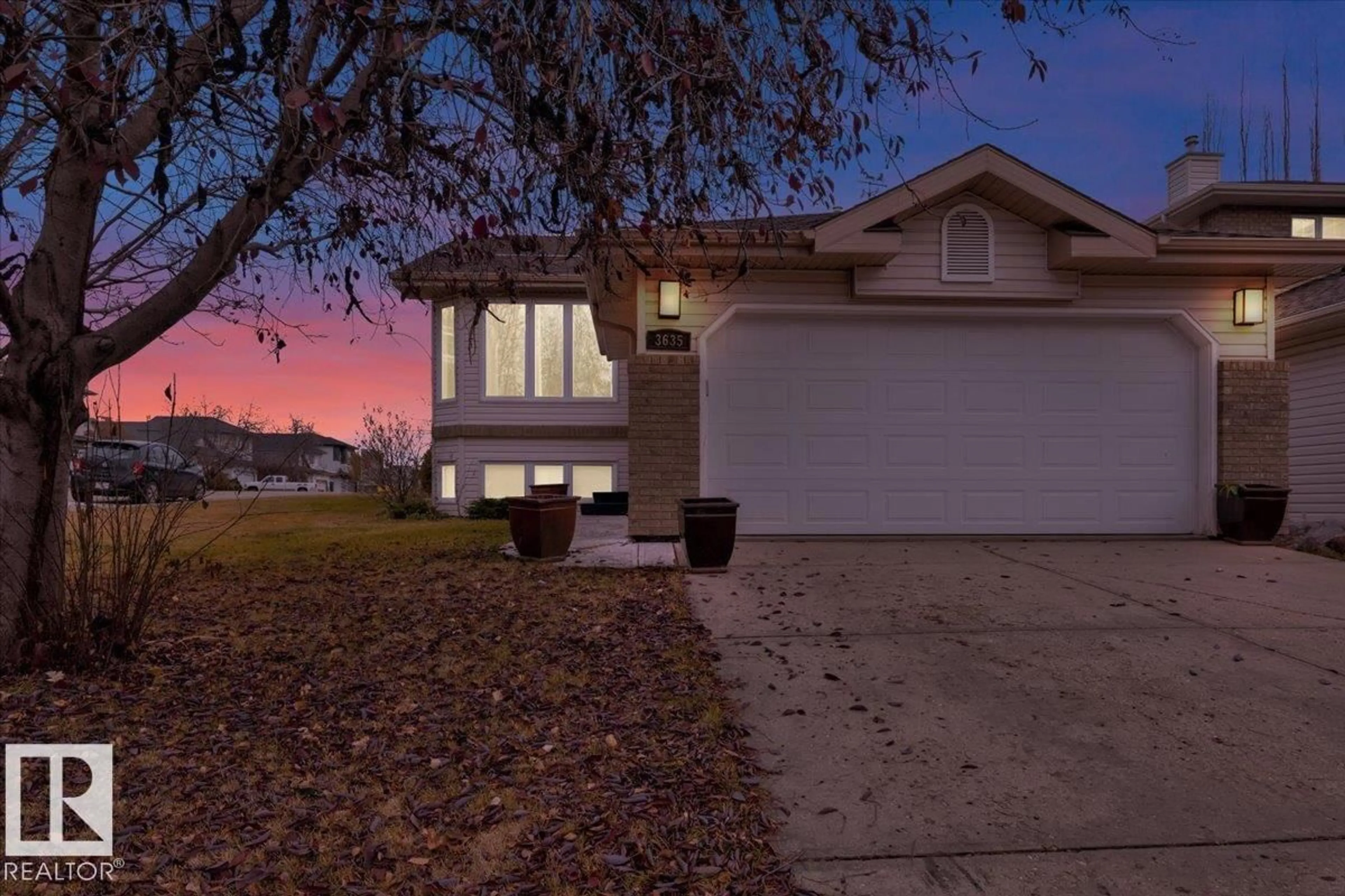 Home with vinyl exterior material, street for 3635 44 ST, Edmonton Alberta T6L7C3