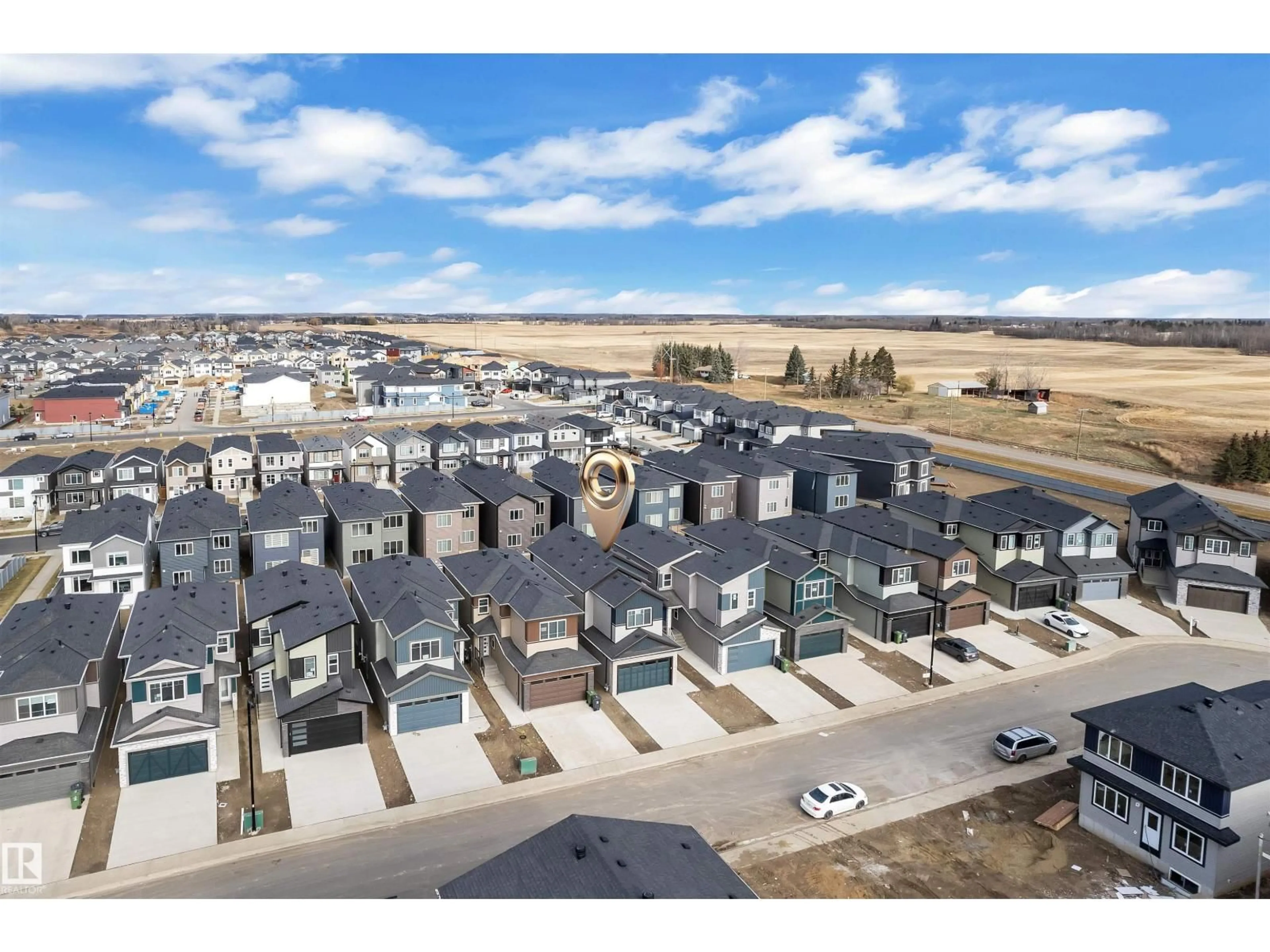 A pic from outside/outdoor area/front of a property/back of a property/a pic from drone, mountain view for 3516 41 AV, Beaumont Alberta T4X3H3