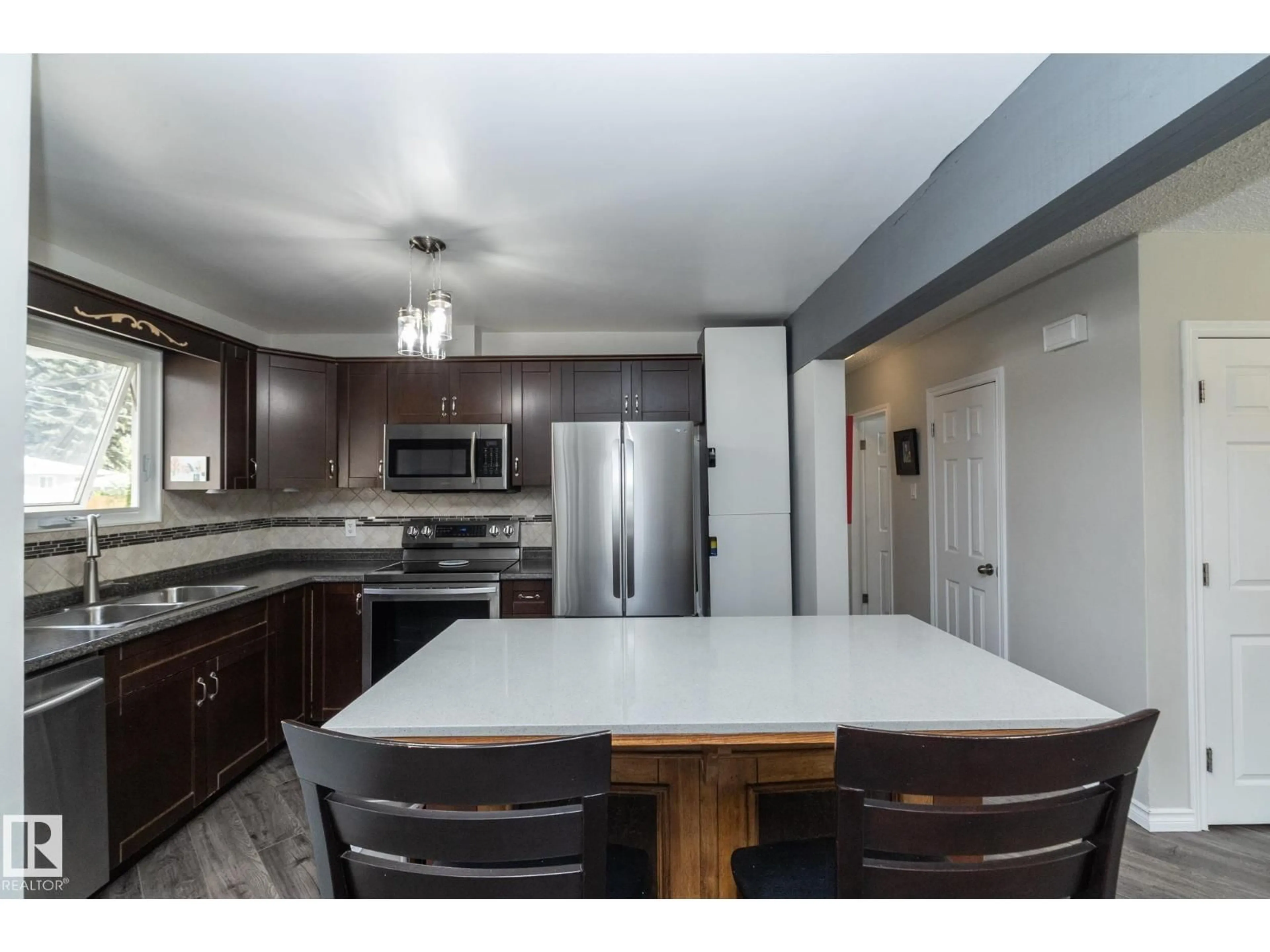 Open concept kitchen, unknown for 3418 120 AV, Edmonton Alberta T5W1K2