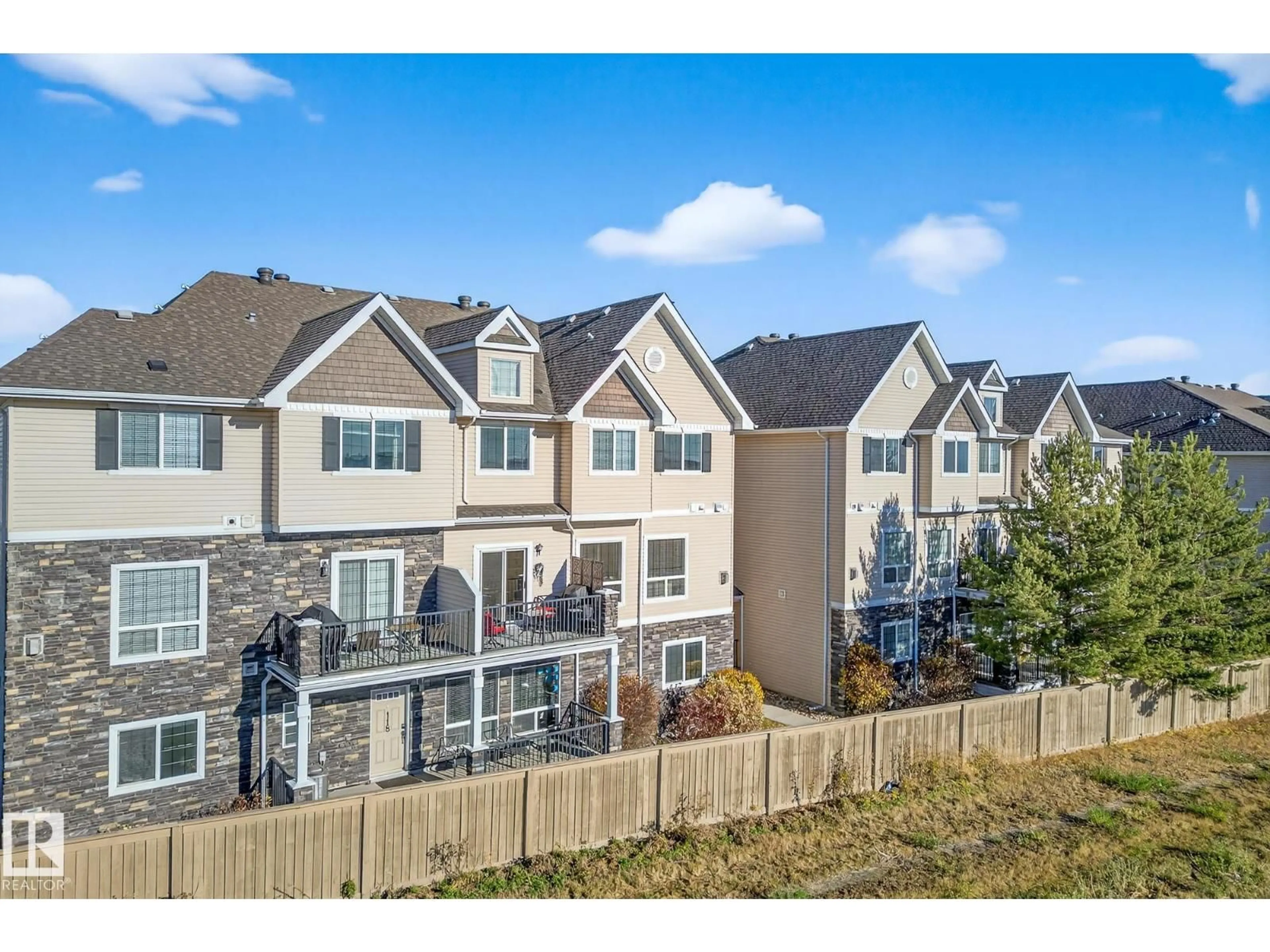 A pic from outside/outdoor area/front of a property/back of a property/a pic from drone, mountain view for 7293 - 117 SOUTH TERWILLEGAR DR, Edmonton Alberta T6R0N5