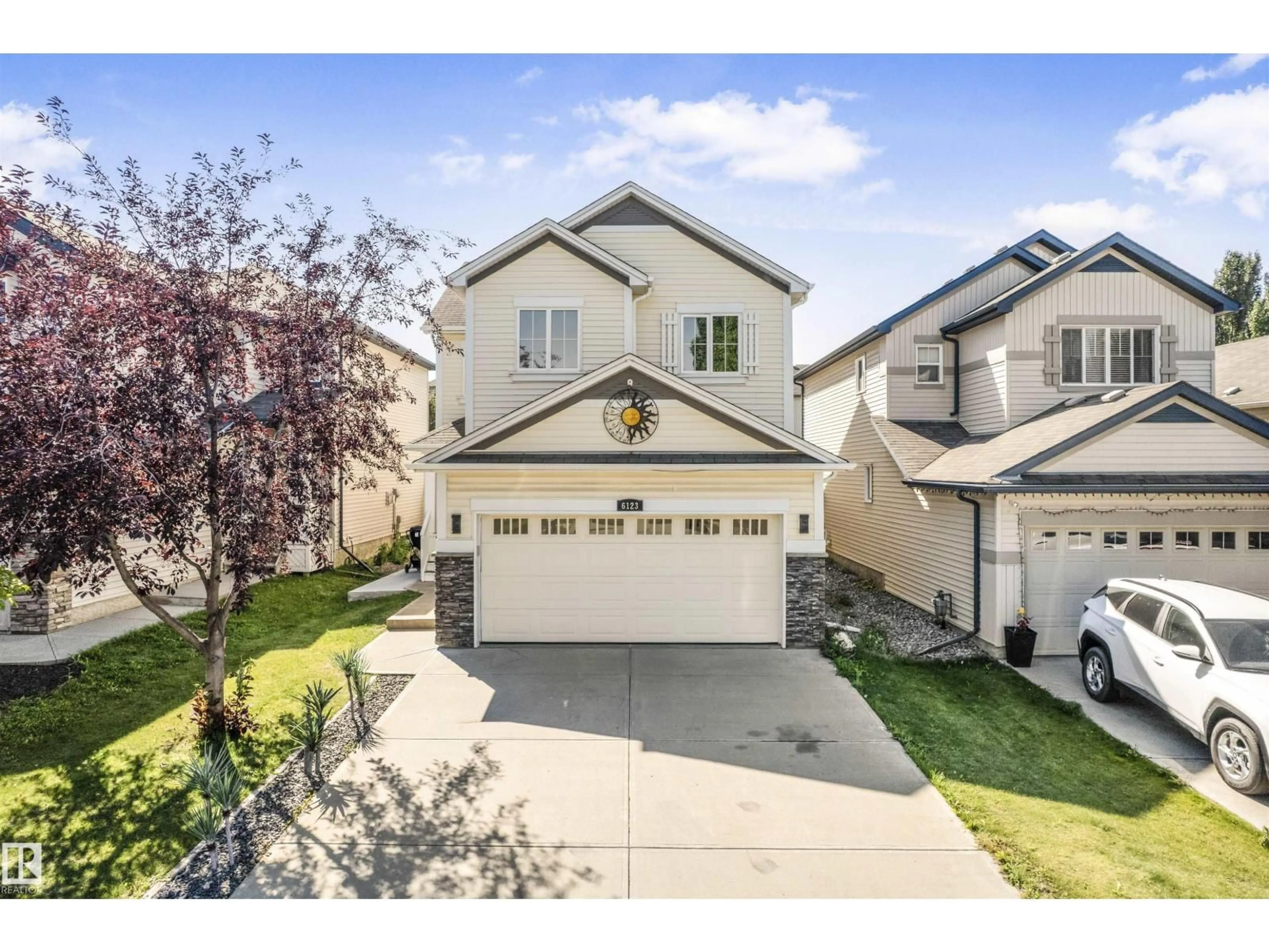 Home with vinyl exterior material, street for SW - 6123 11 AV, Edmonton Alberta T6X0M4