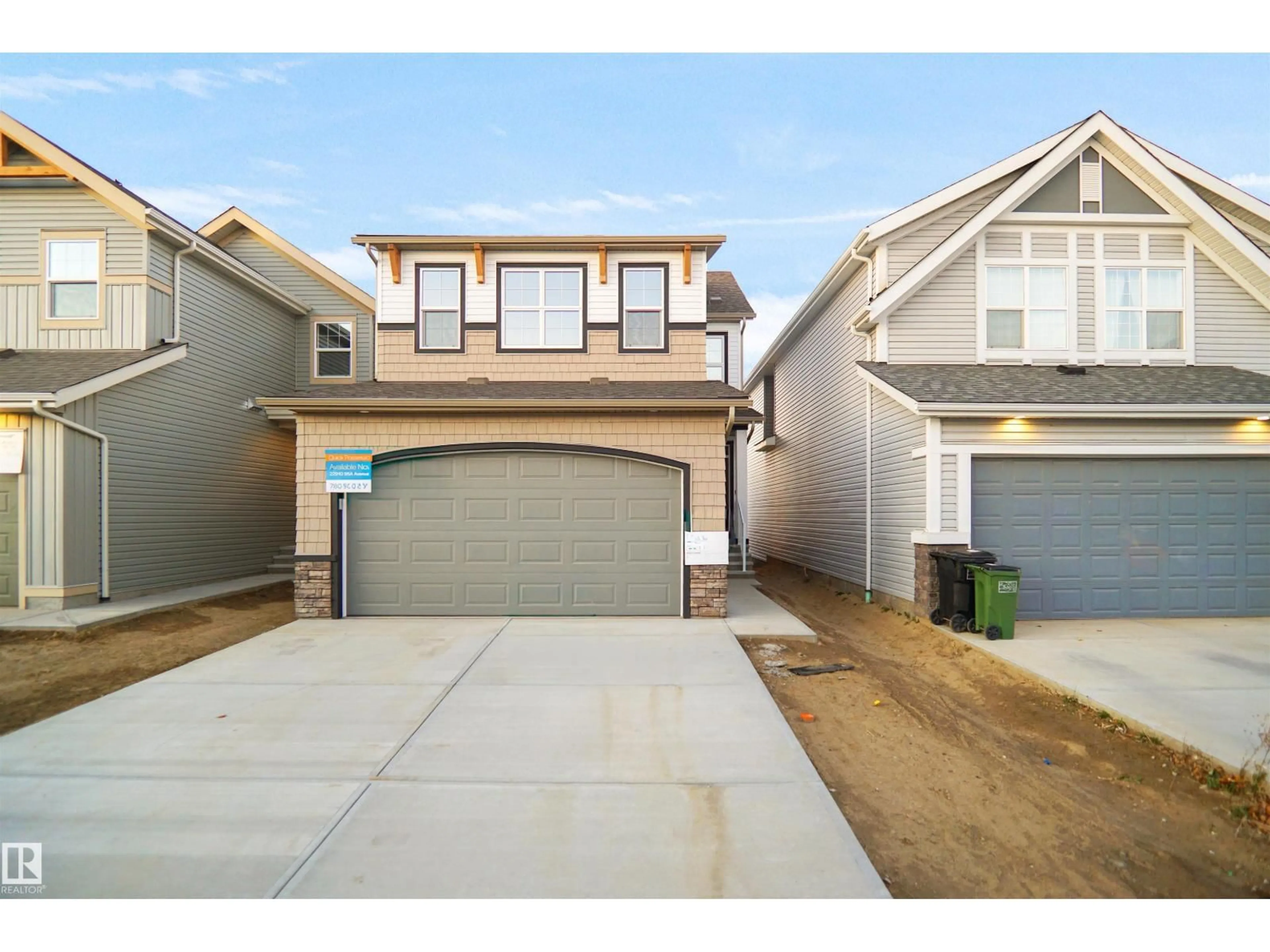 Home with vinyl exterior material, street for 22910 95A AV, Edmonton Alberta T5T7A7