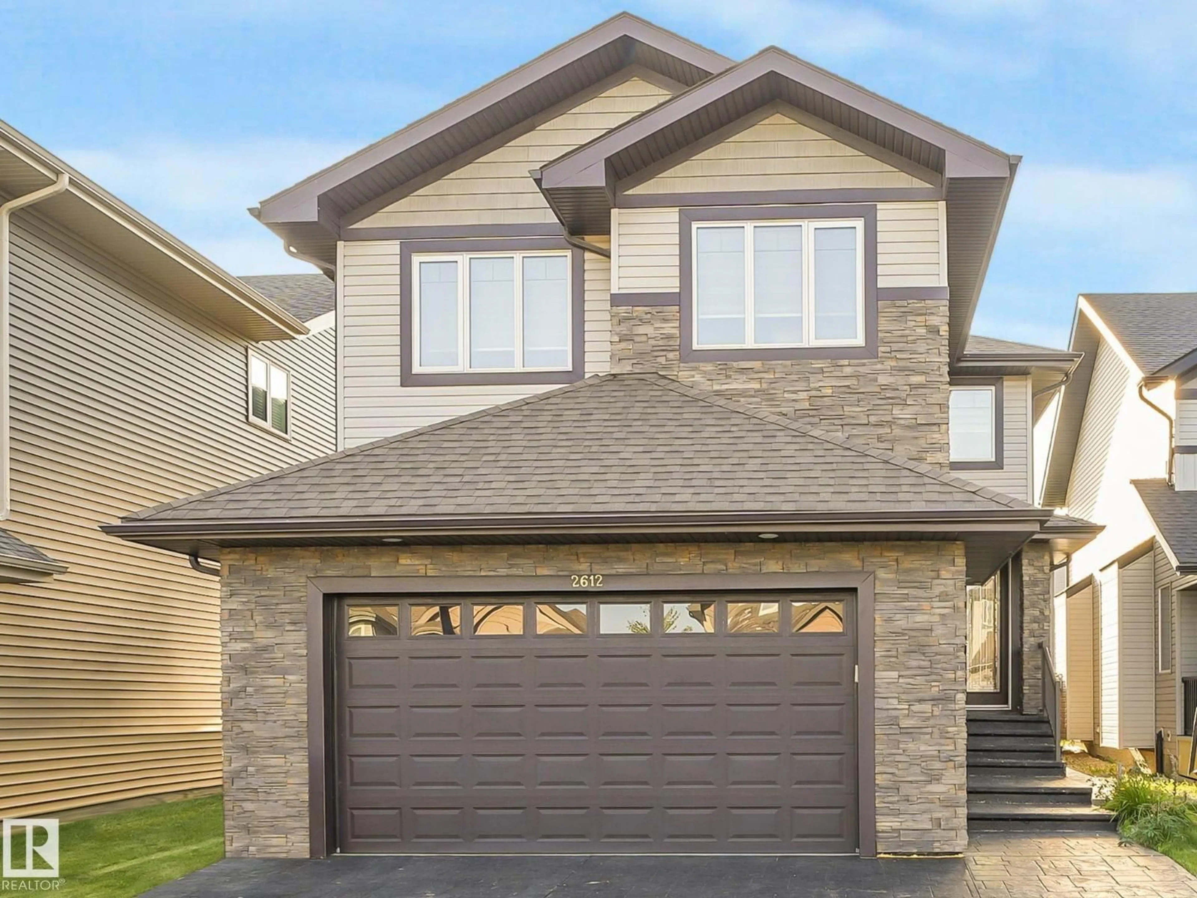 Home with vinyl exterior material, street for 2612 ADAM CO SW, Edmonton Alberta T6W3C1