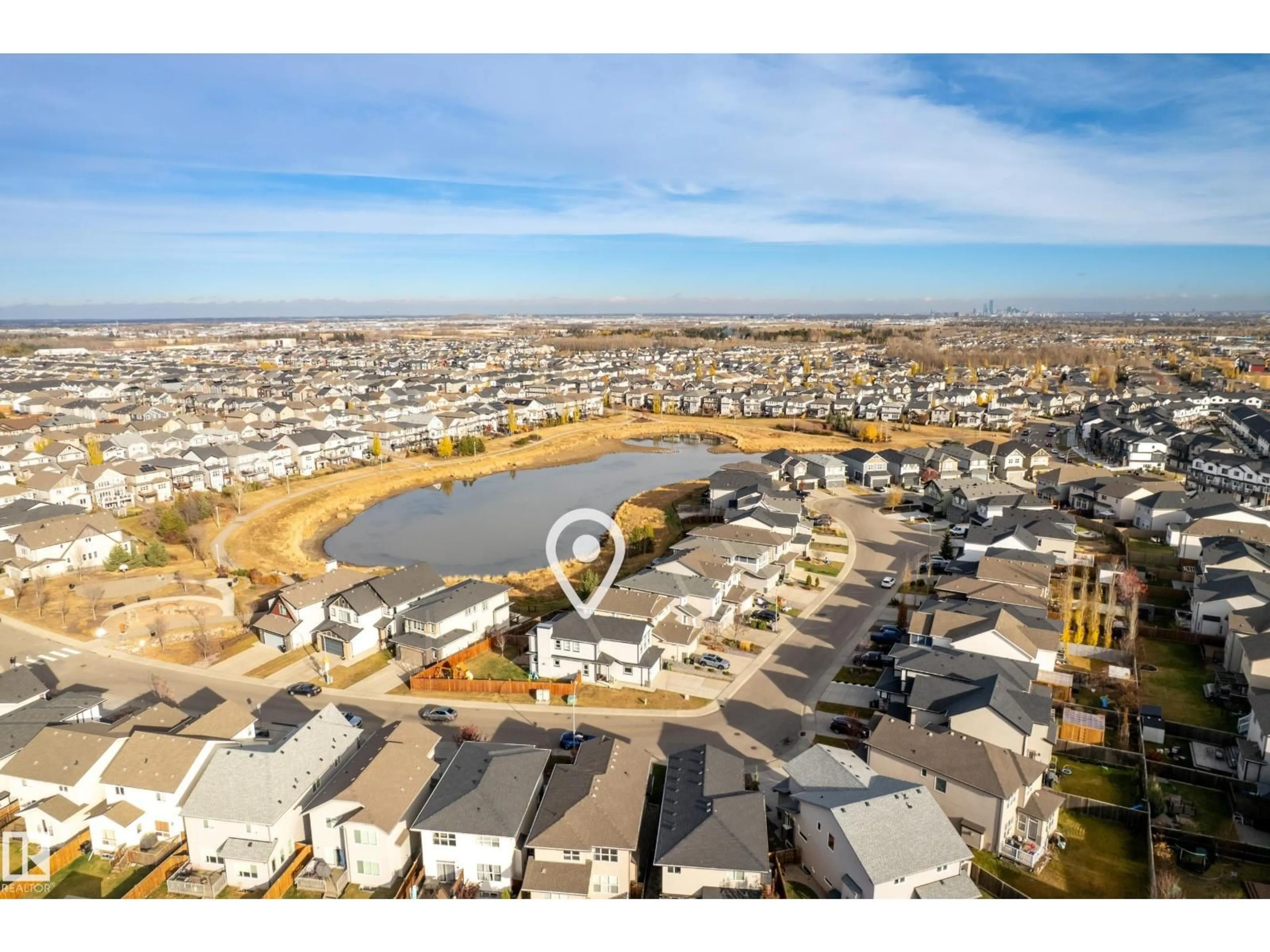 A pic from outside/outdoor area/front of a property/back of a property/a pic from drone, water/lake/river/ocean view for 1374 SECORD LANDING LD, Edmonton Alberta T5T5W7