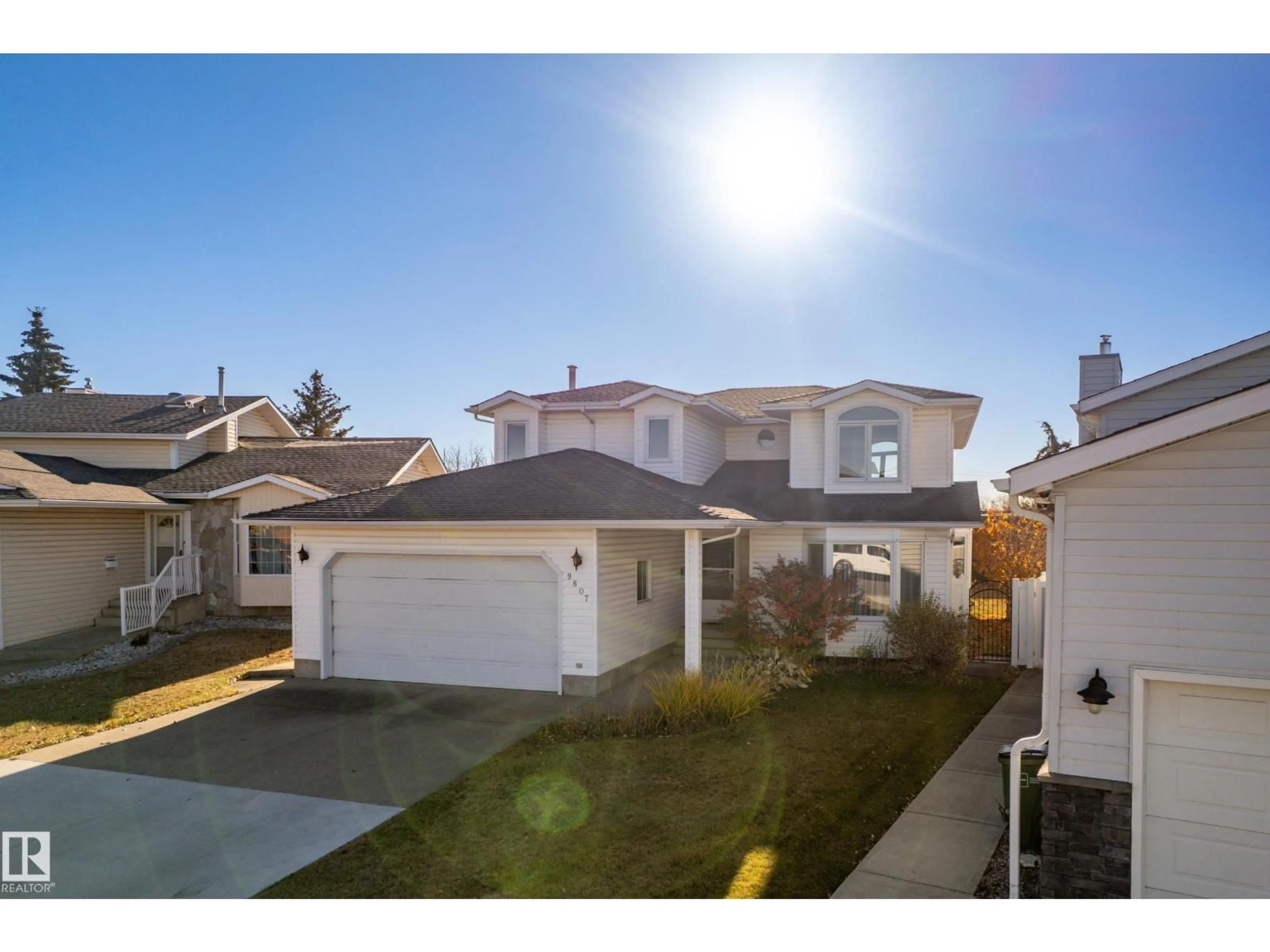 A pic from outside/outdoor area/front of a property/back of a property/a pic from drone, street for 9807 154 AV, Edmonton Alberta T5X5R2