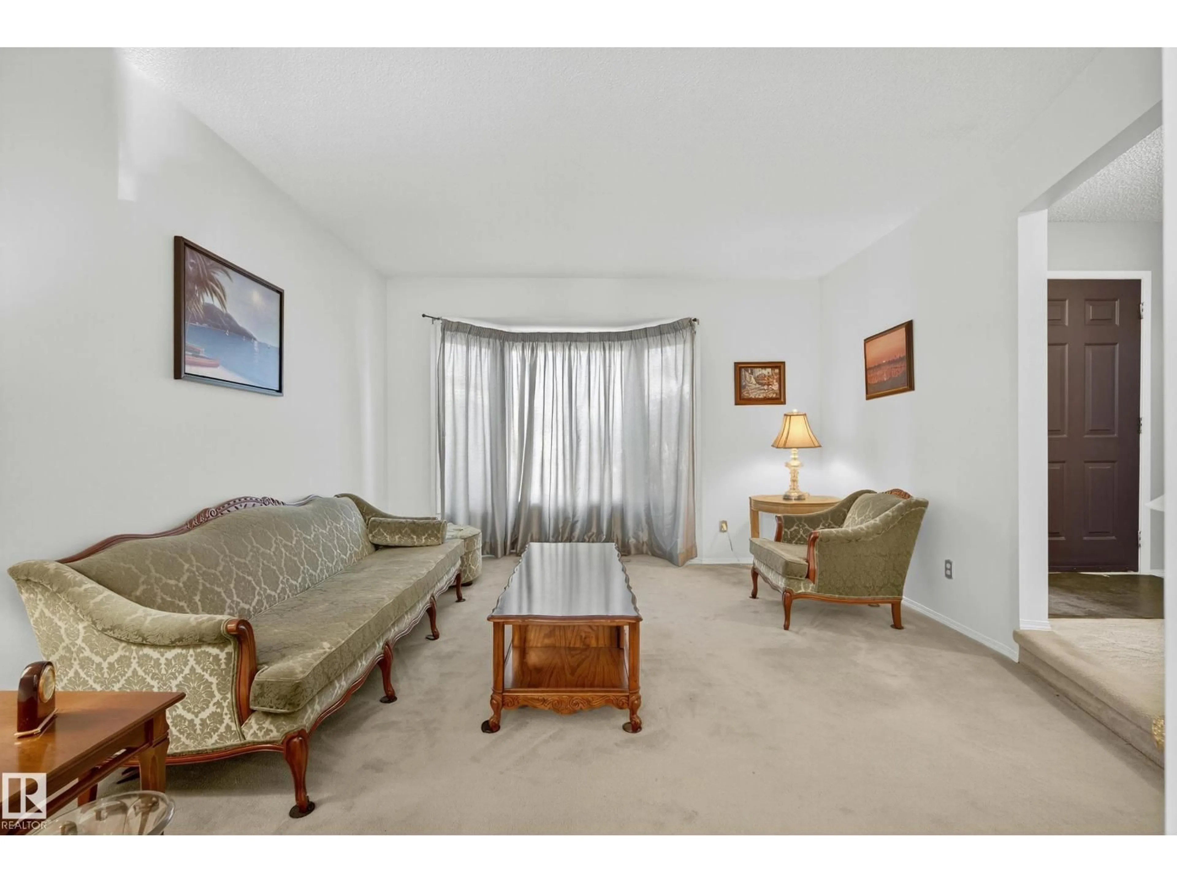 Living room with furniture, unknown for 9807 154 AV, Edmonton Alberta T5X5R2