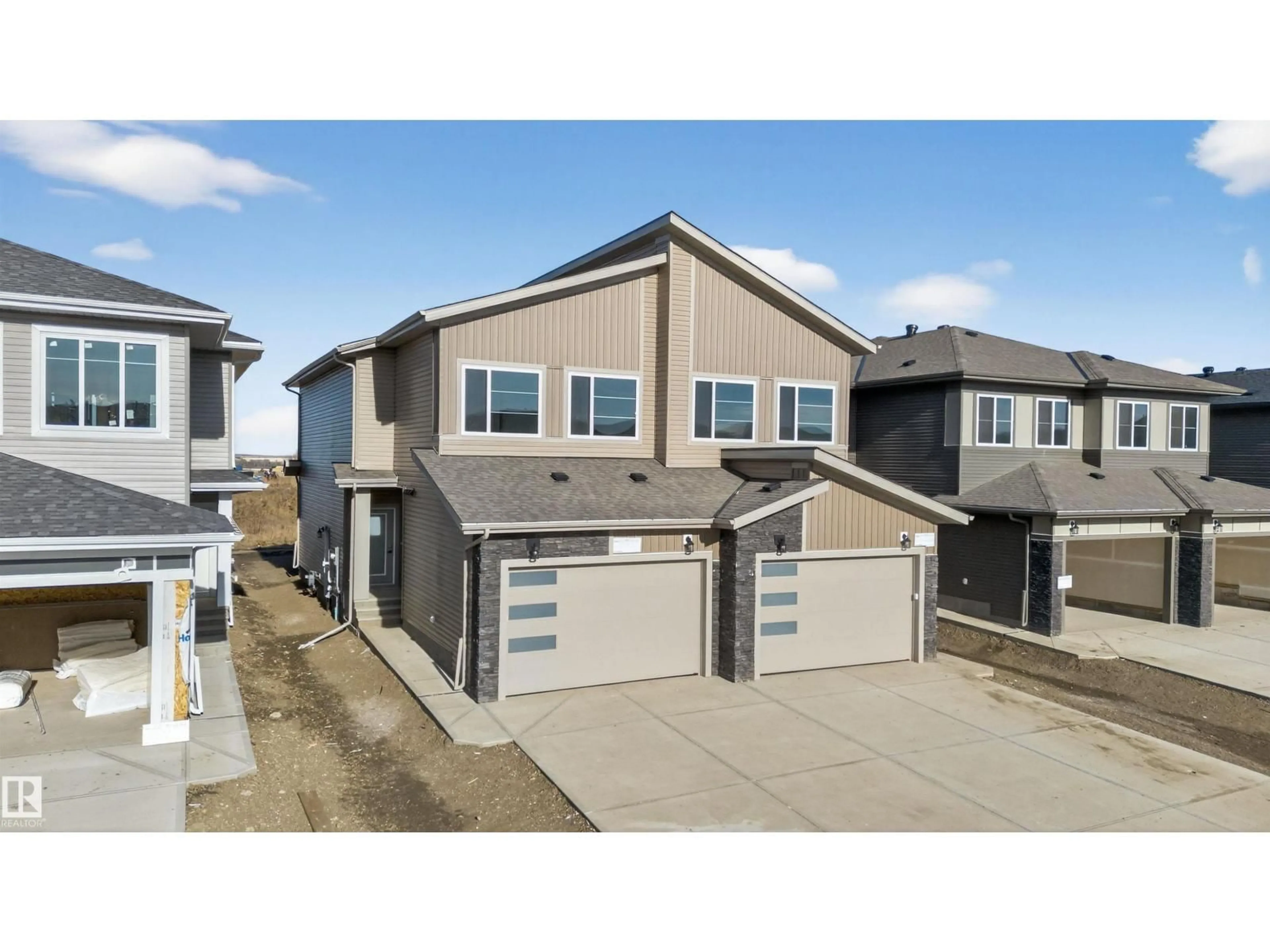 A pic from outside/outdoor area/front of a property/back of a property/a pic from drone, street for 153 PIERWYCK LO, Spruce Grove Alberta T7X4G3