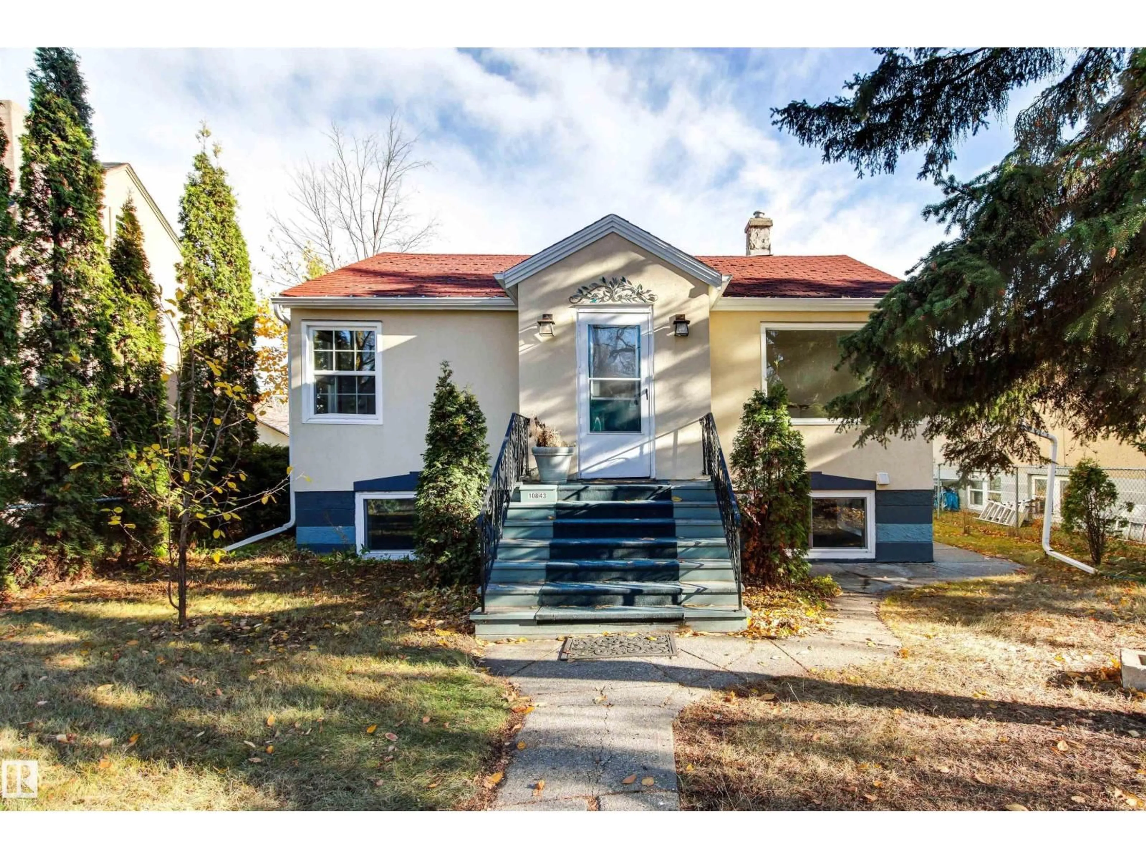 Home with vinyl exterior material, street for 10843 92 ST, Edmonton Alberta T5H1V9