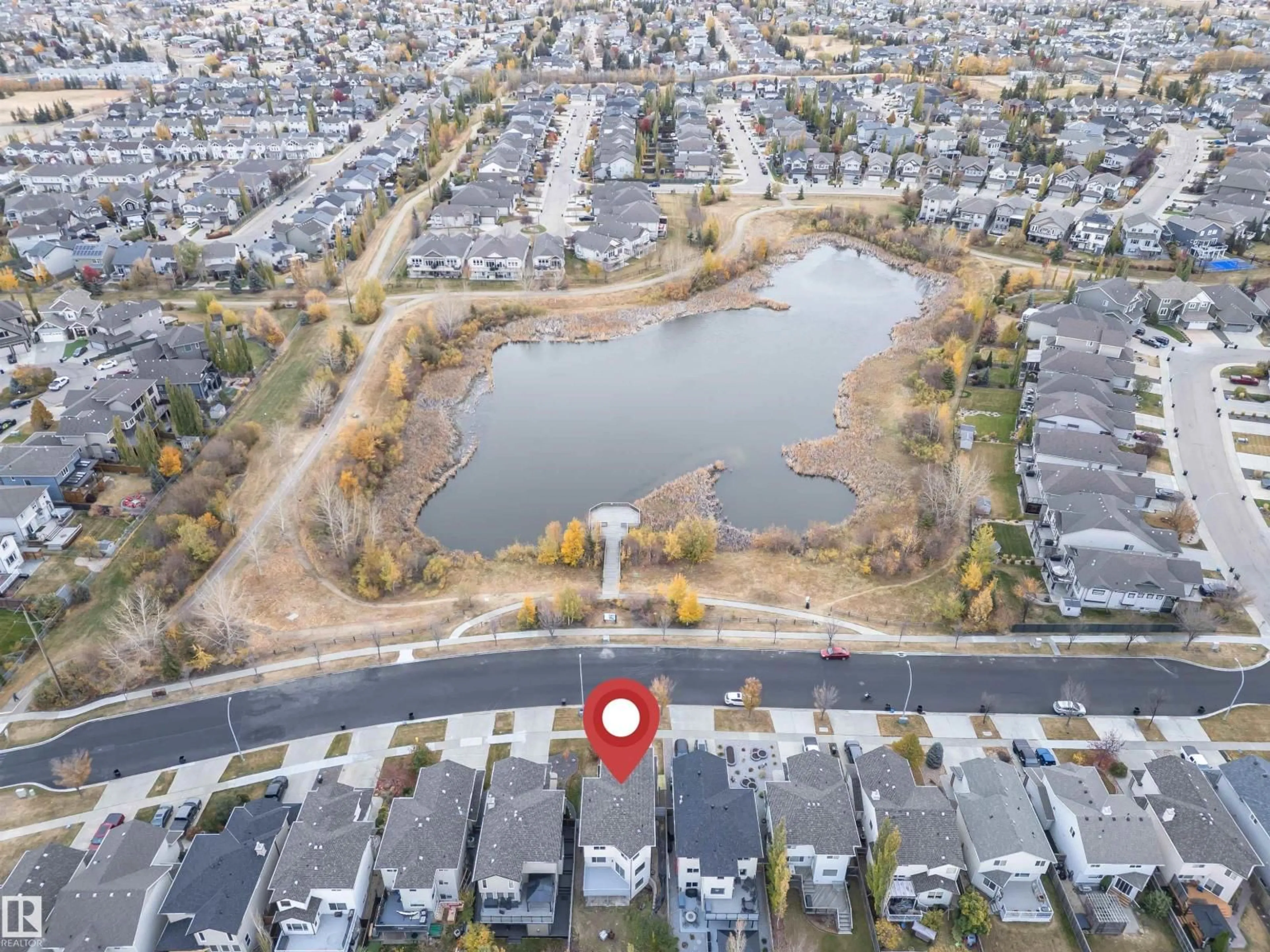 A pic from outside/outdoor area/front of a property/back of a property/a pic from drone, water/lake/river/ocean view for 424 CRIMSON DR, Sherwood Park Alberta T8H0H2