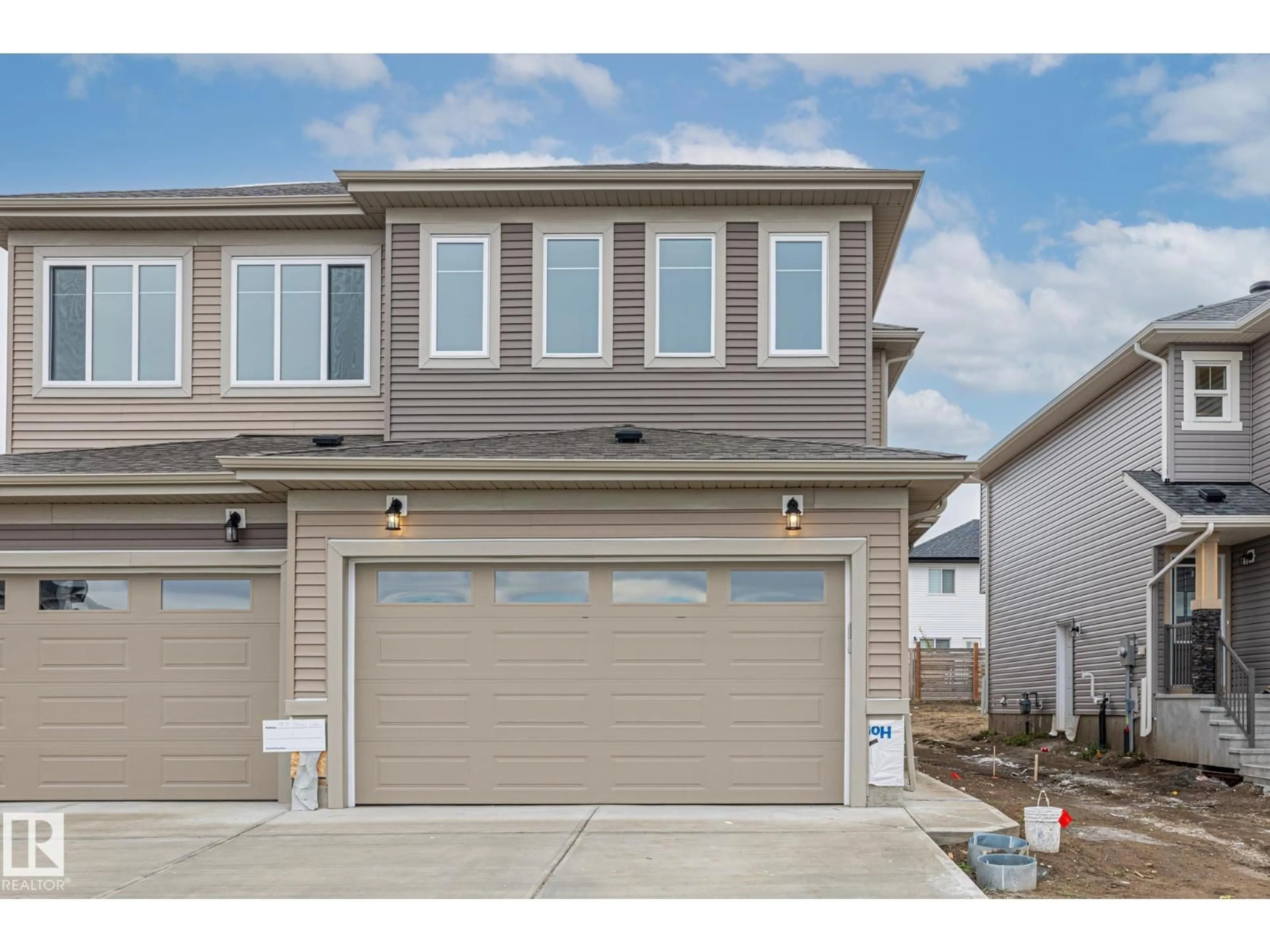 Home with vinyl exterior material, street for 97 FICUS WY, Fort Saskatchewan Alberta T8L0Z6