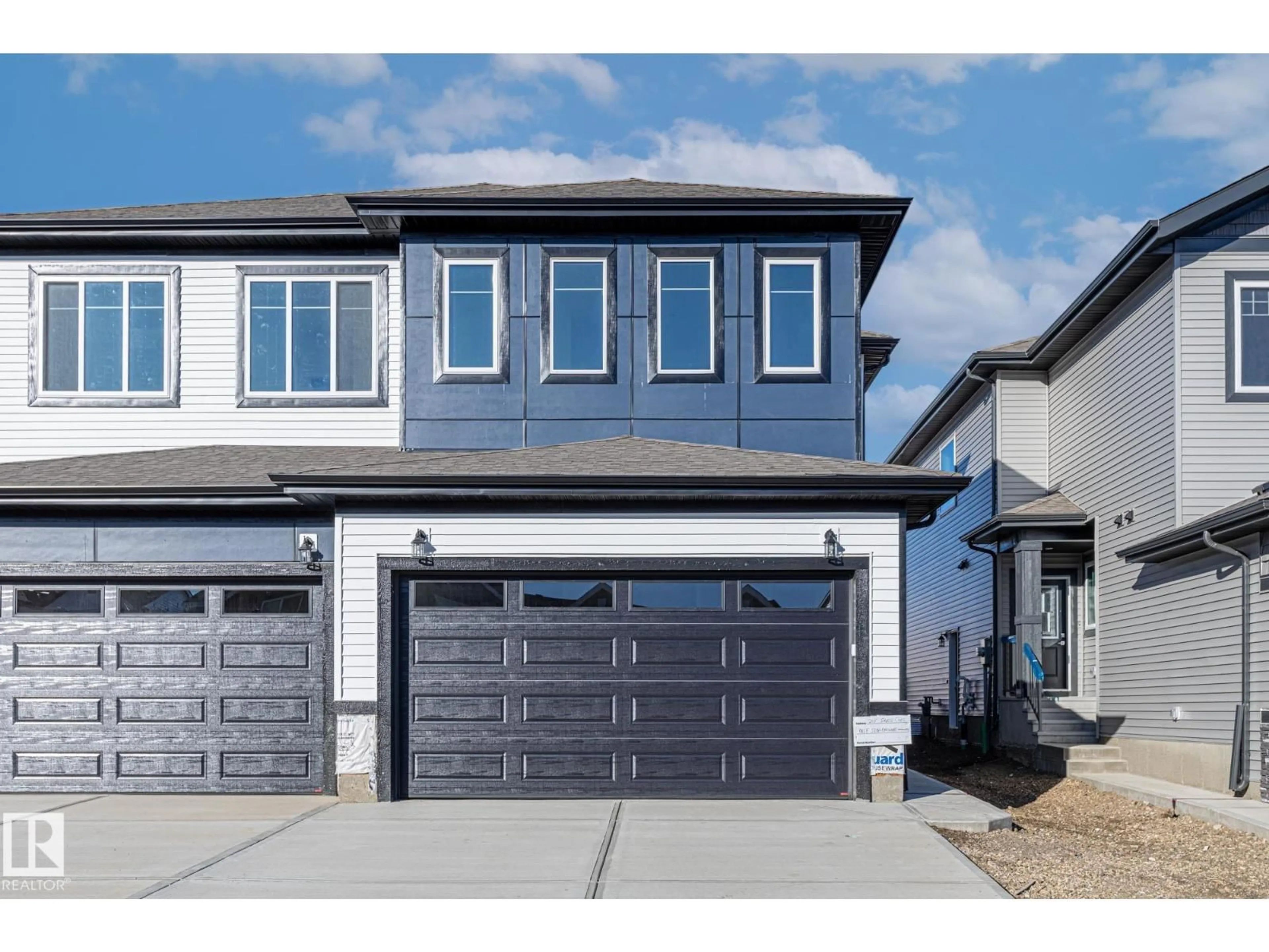 Home with vinyl exterior material, street for 215 SAVOY CR, Sherwood Park Alberta T8H3A8