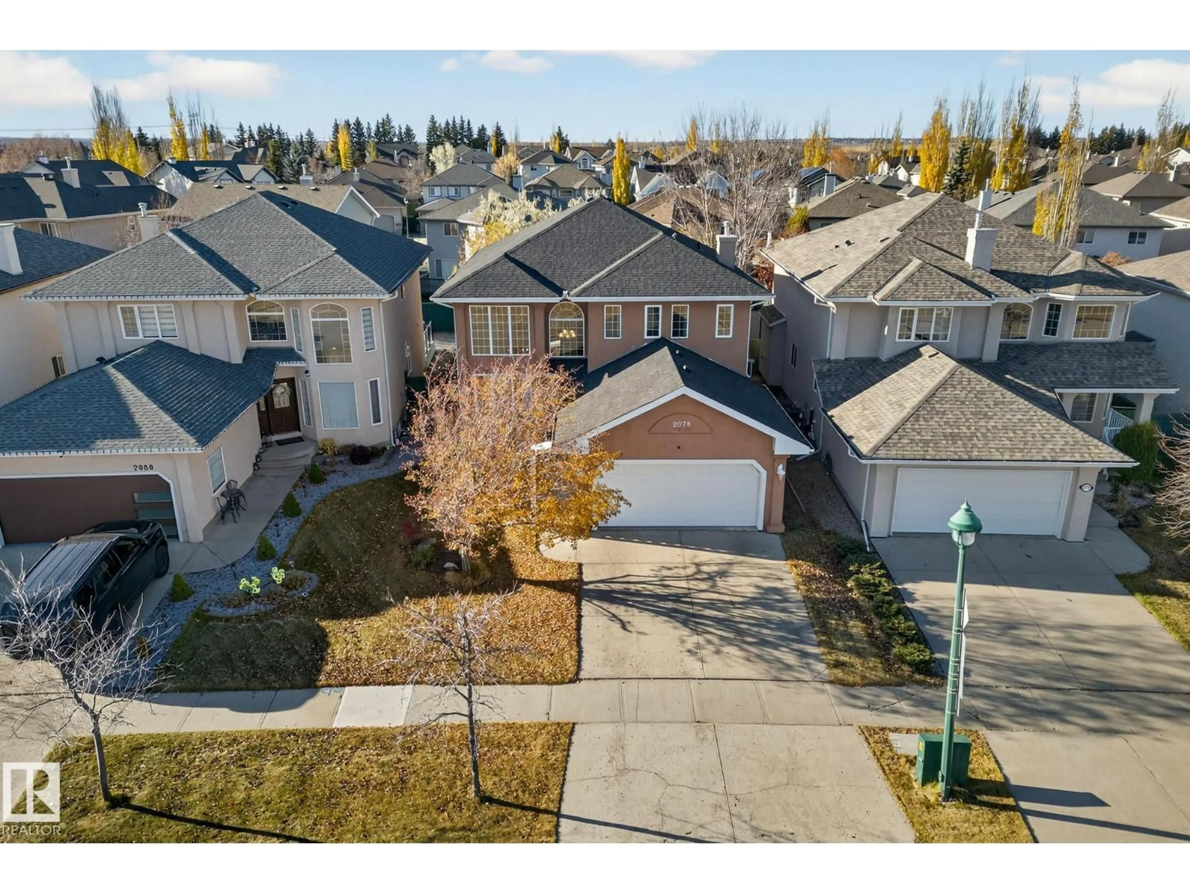 A pic from outside/outdoor area/front of a property/back of a property/a pic from drone, street for 2078 HADDOW DR, Edmonton Alberta T6R3B8