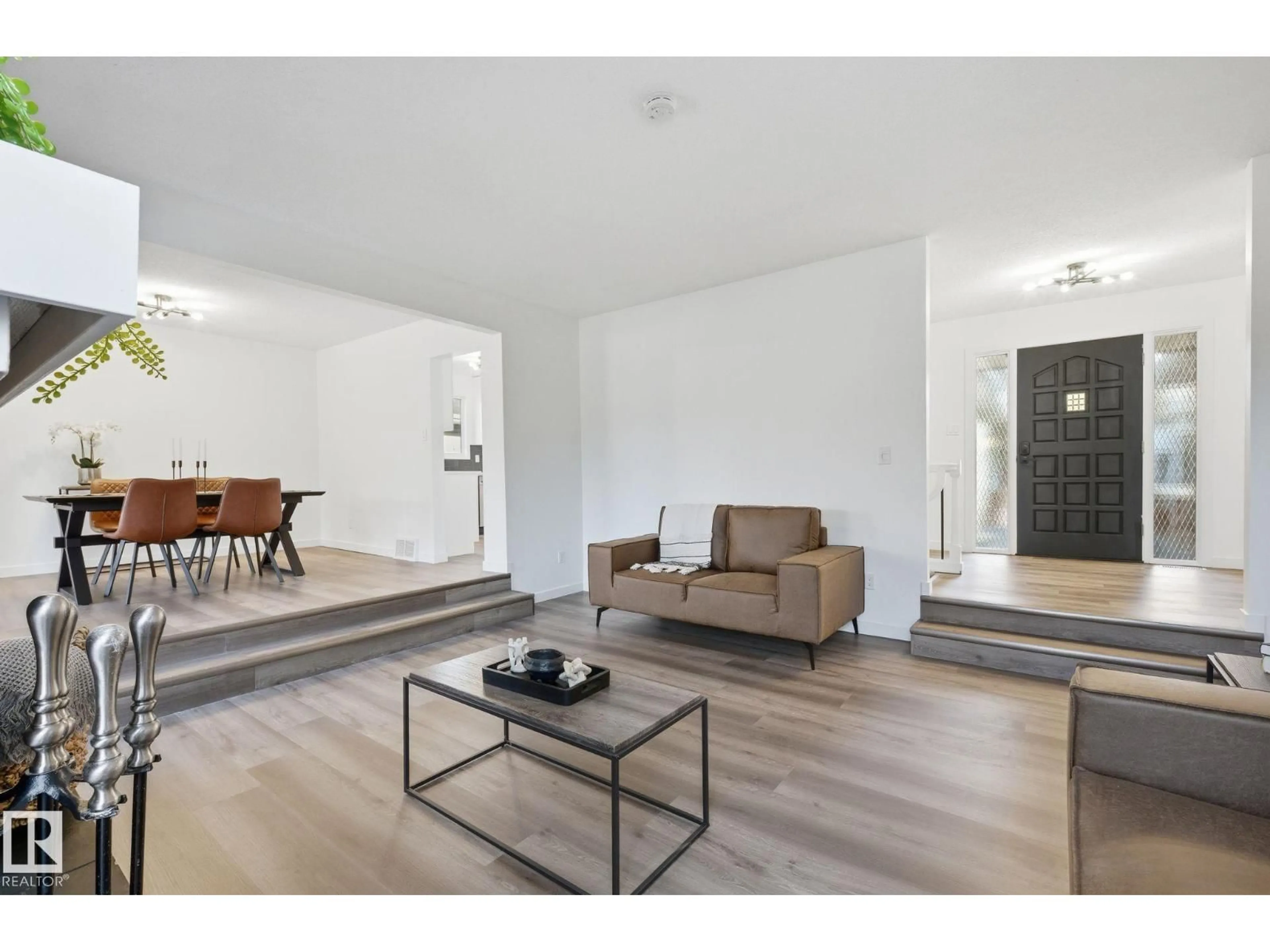 Living room with furniture, unknown for NW - 2722 104A ST, Edmonton Alberta T6J4C3