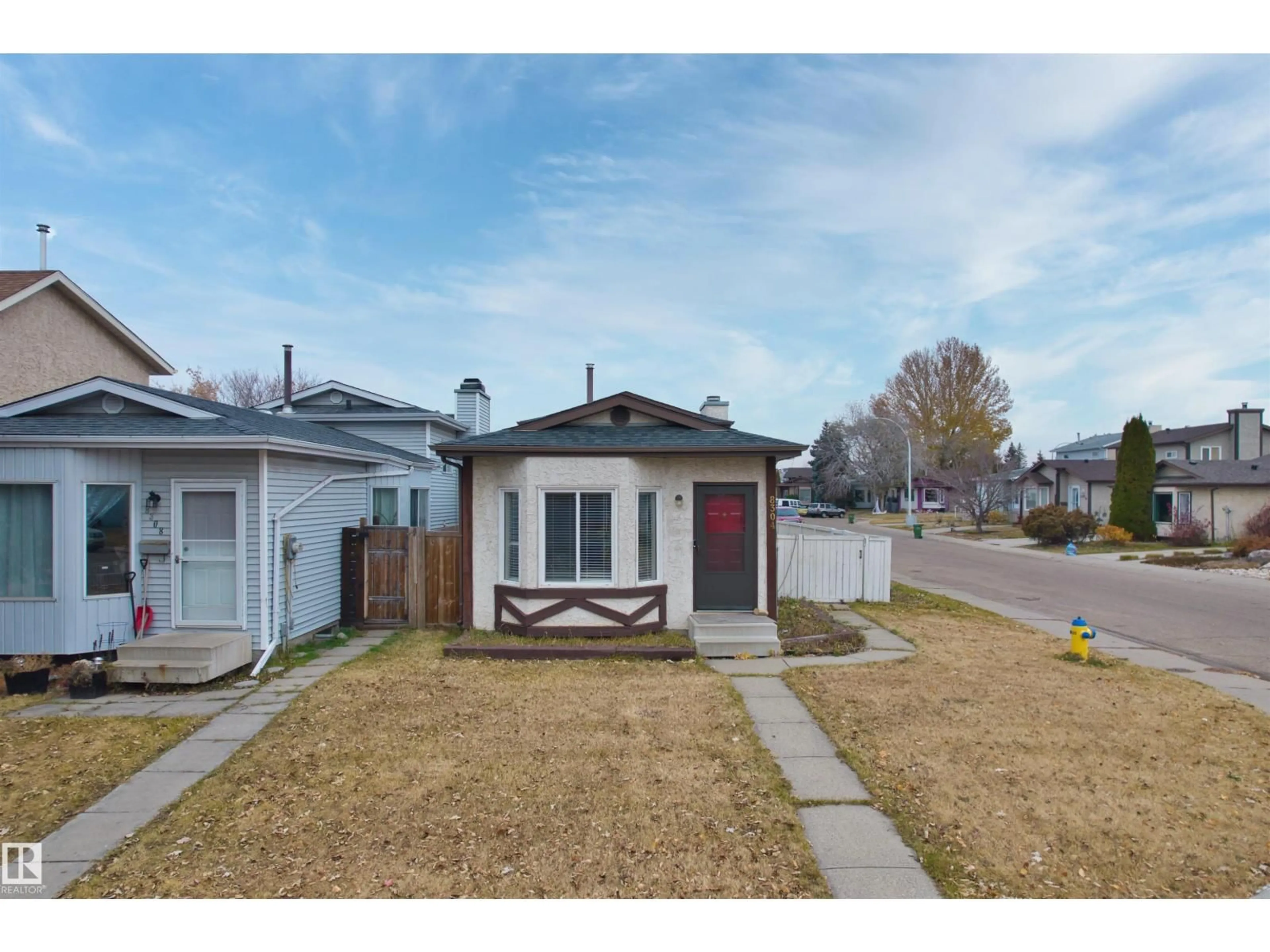 A pic from outside/outdoor area/front of a property/back of a property/a pic from drone, street for 8304 157 AV, Edmonton Alberta T5Z2P8