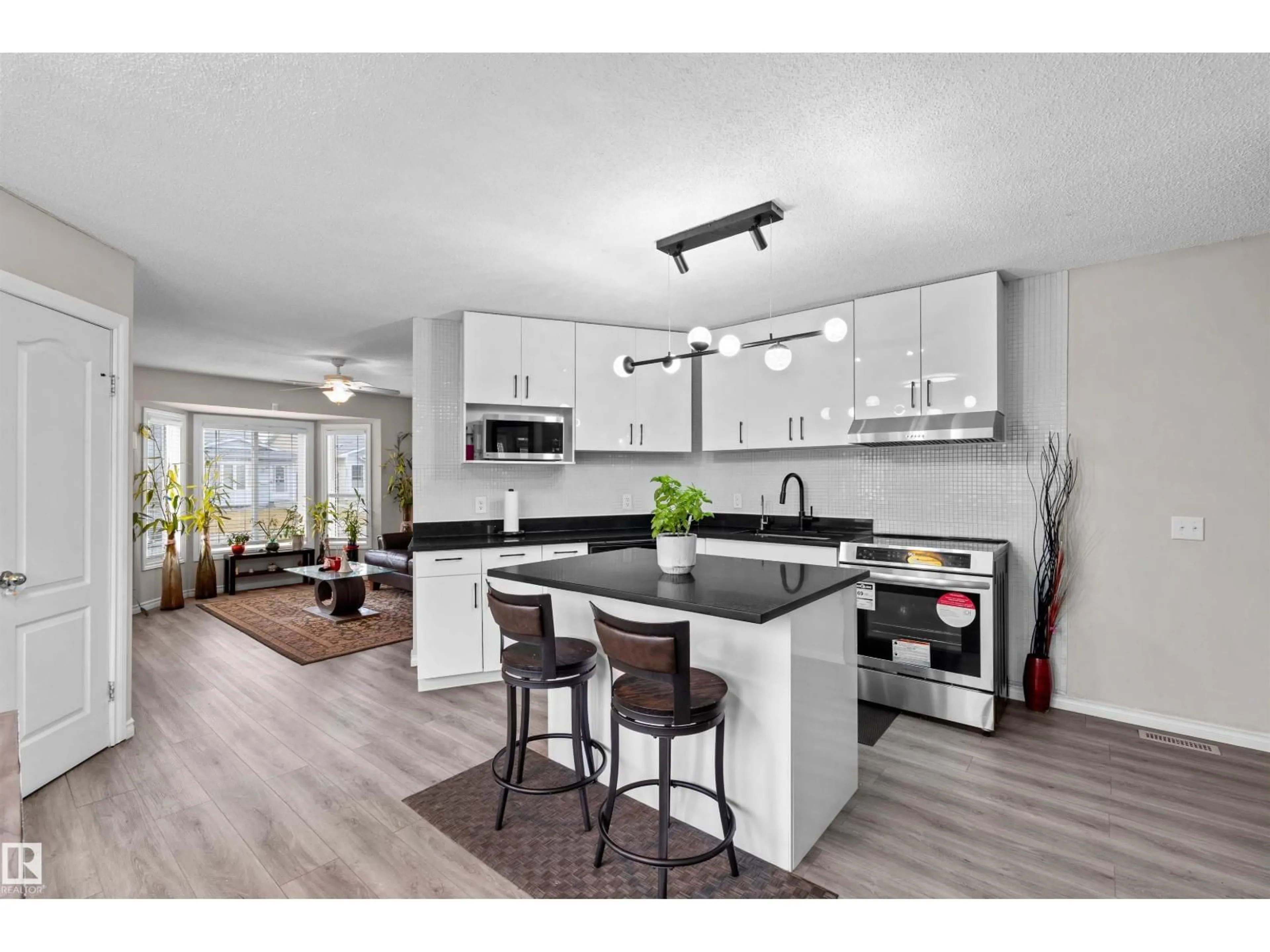 Open concept kitchen, unknown for 8304 157 AV, Edmonton Alberta T5Z2P8