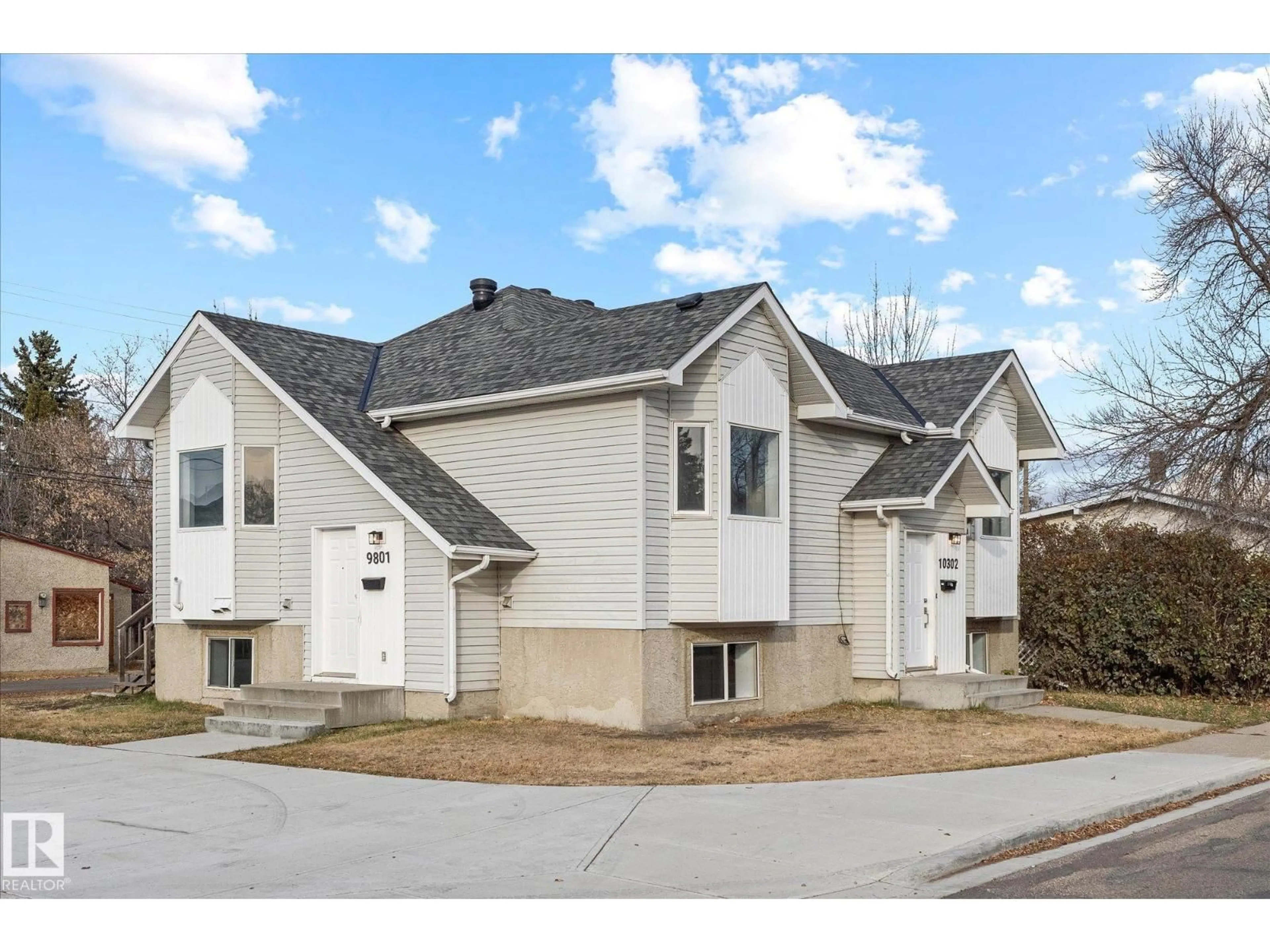 Home with vinyl exterior material, street for 9801 103 ST, Fort Saskatchewan Alberta T8L2C7