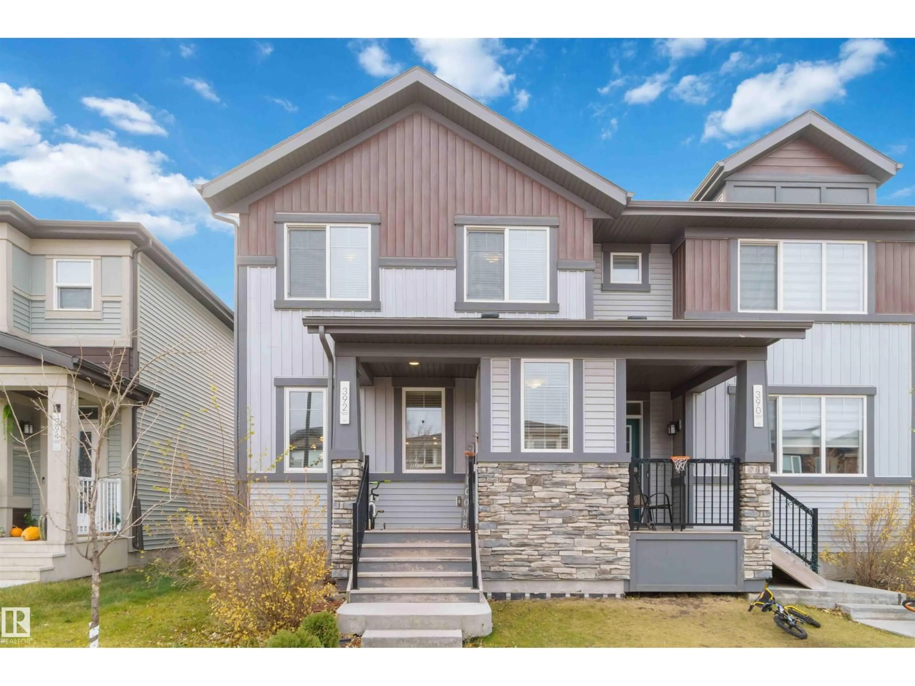 Home with vinyl exterior material, street for 392 CHARLESWORTH DR, Edmonton Alberta T6X2G5