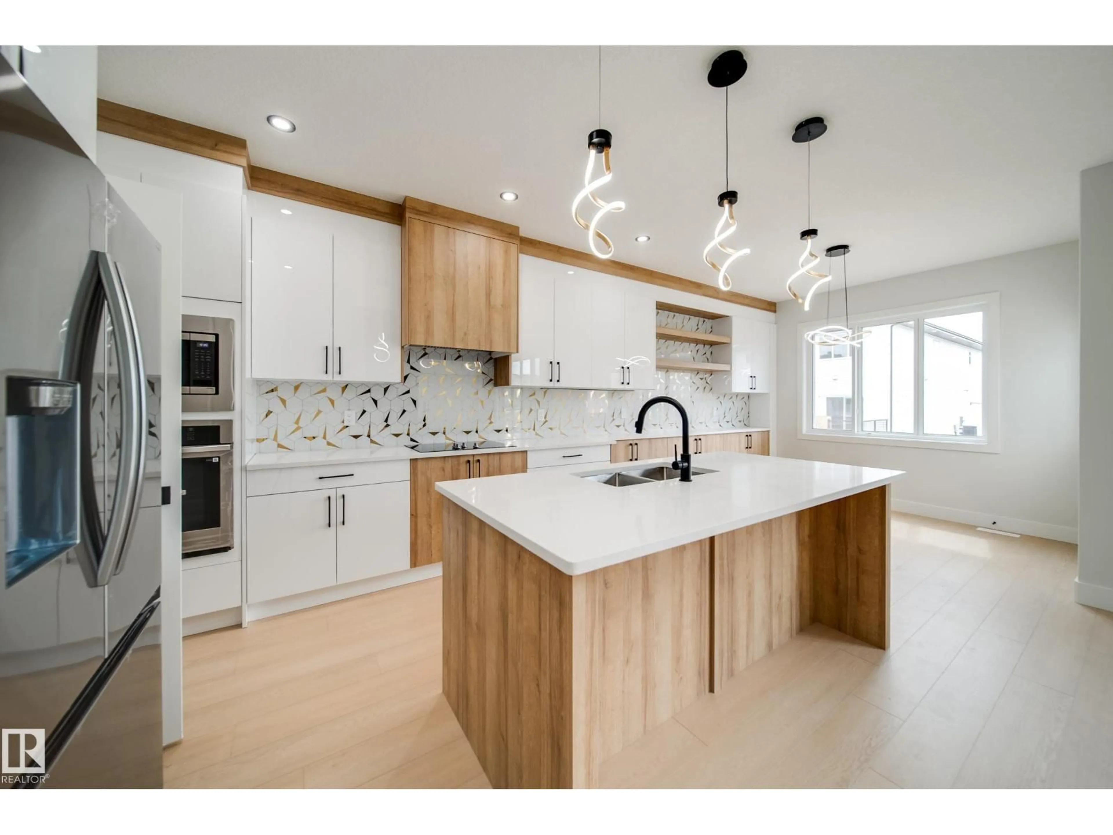 Open concept kitchen, unknown for NW - 8743 183 AV, Edmonton Alberta T5Z0S8