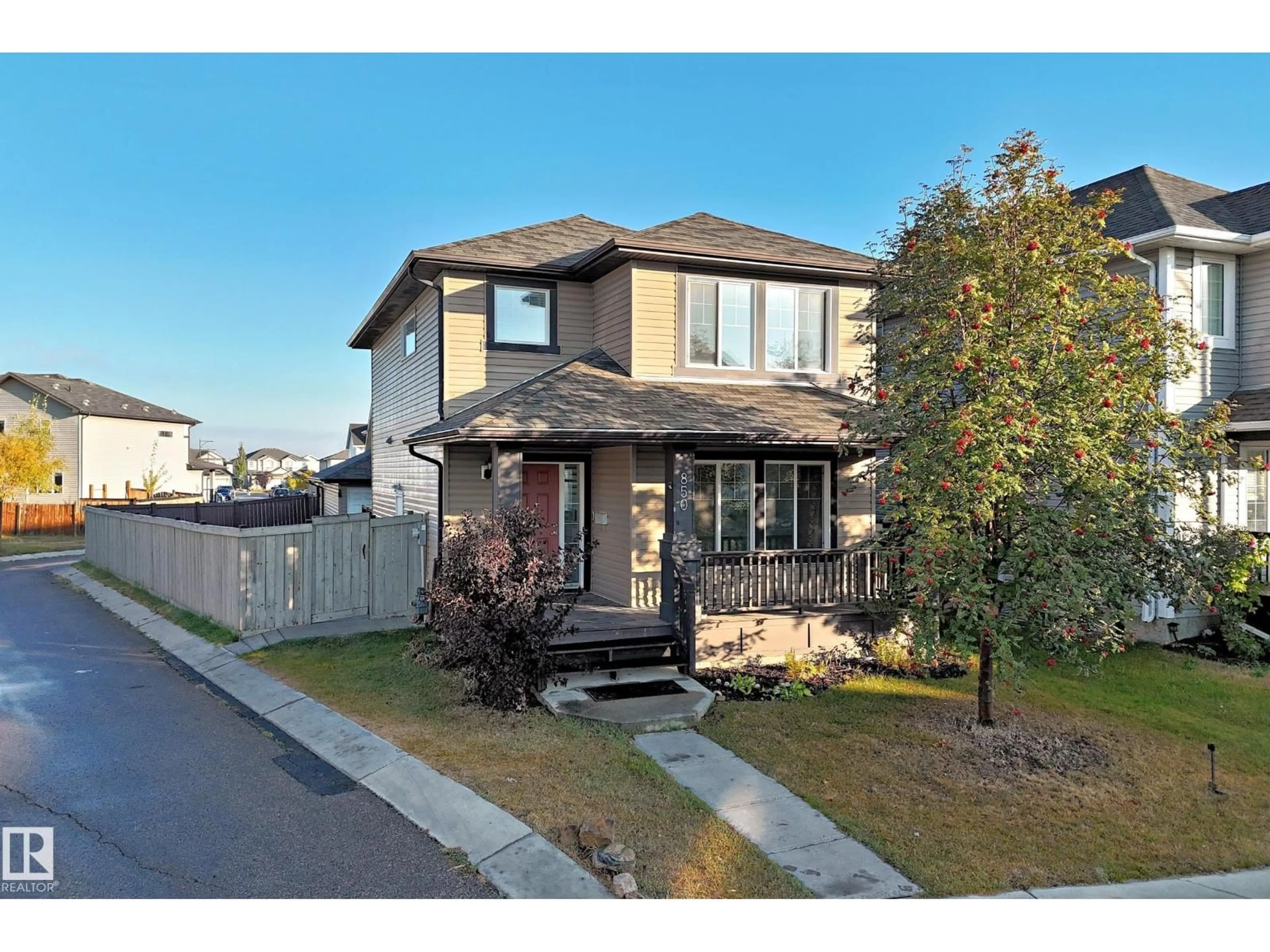 Home with brick exterior material, street for NW - 850 36A AV, Edmonton Alberta T6T0S5