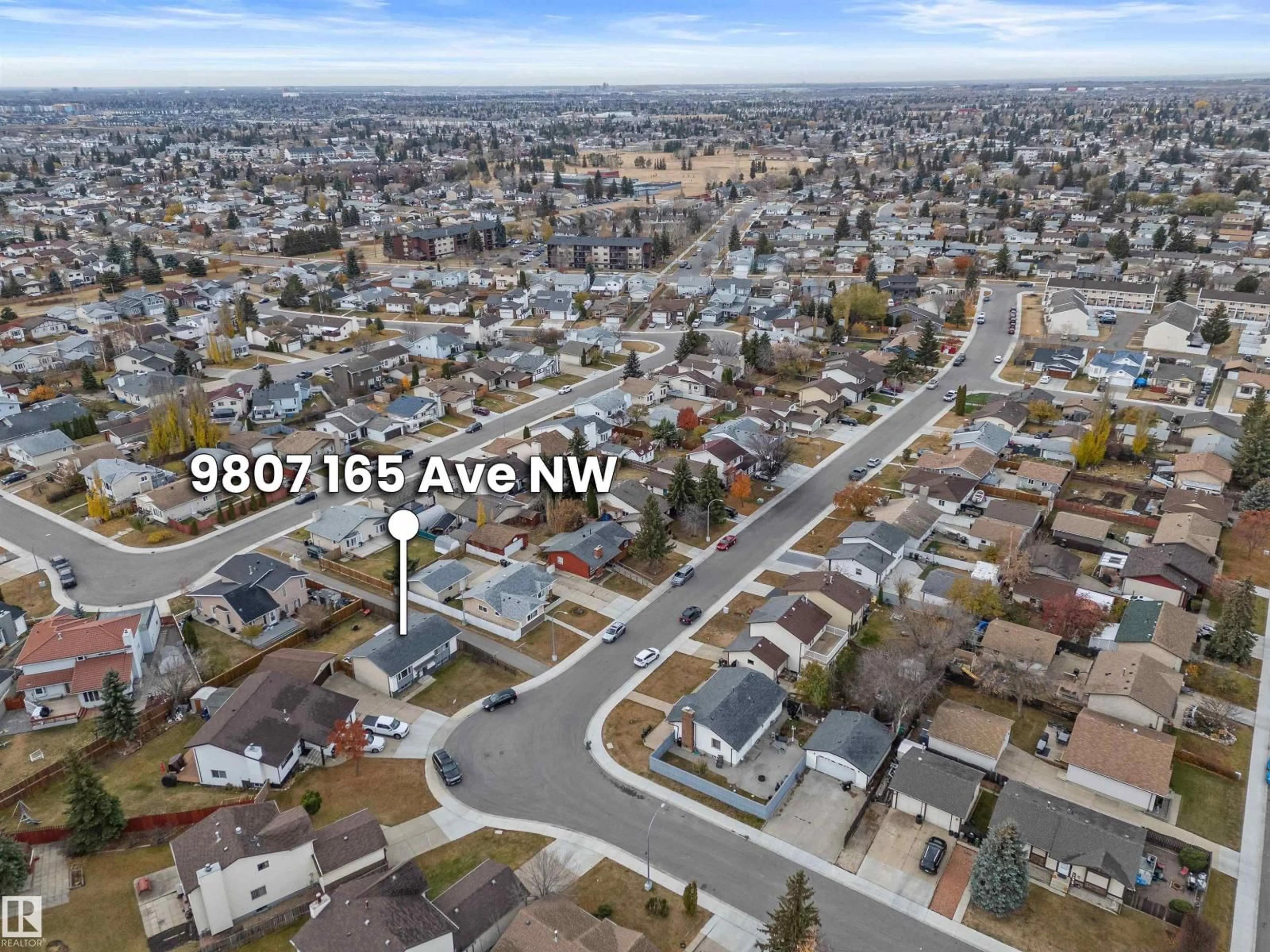 A pic from outside/outdoor area/front of a property/back of a property/a pic from drone, street for NW - 9807 165 AV, Edmonton Alberta T5X4Z1