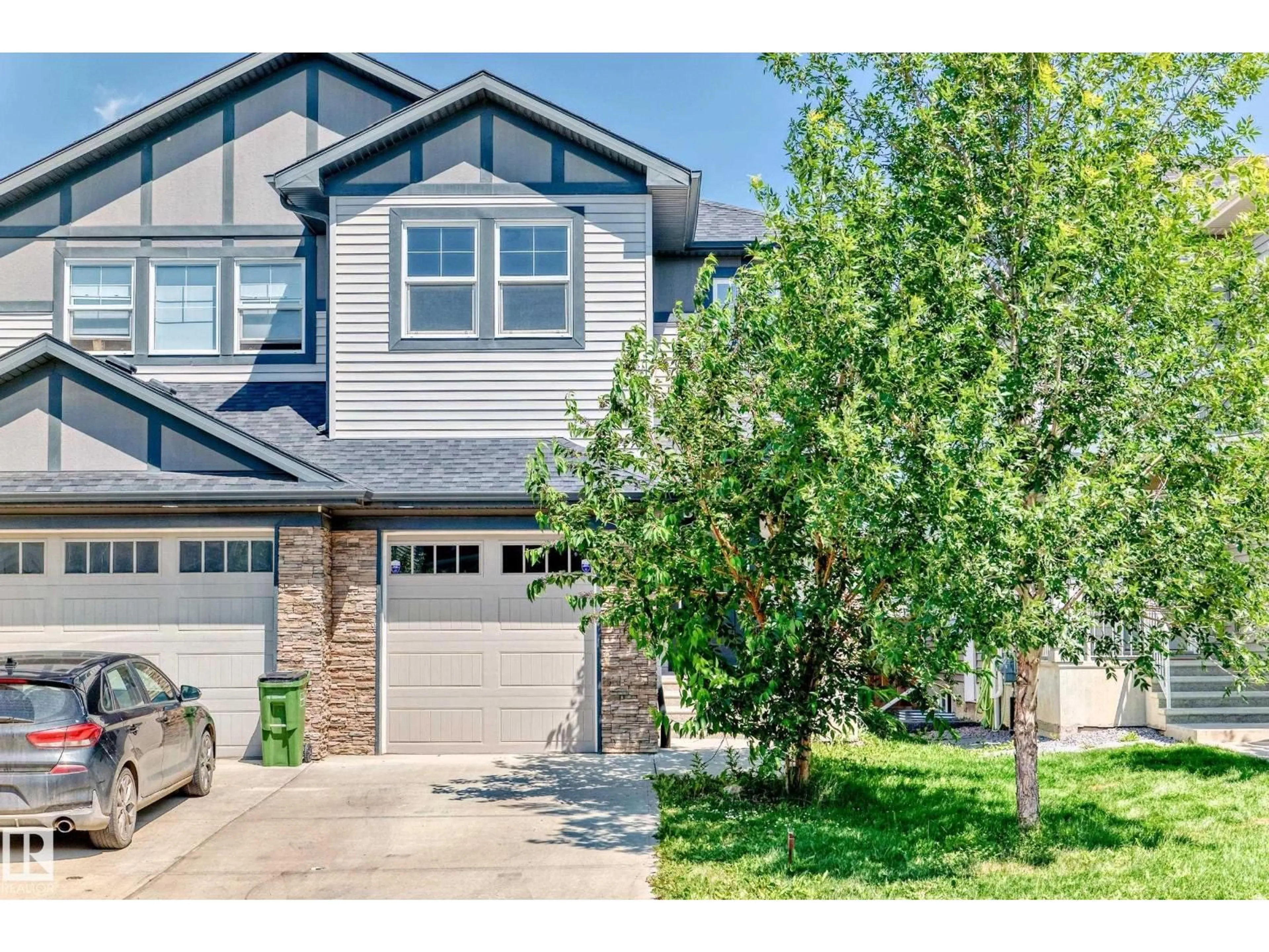 Home with vinyl exterior material, street for SW - 8579 CUSHING PL, Edmonton Alberta T6W3R4