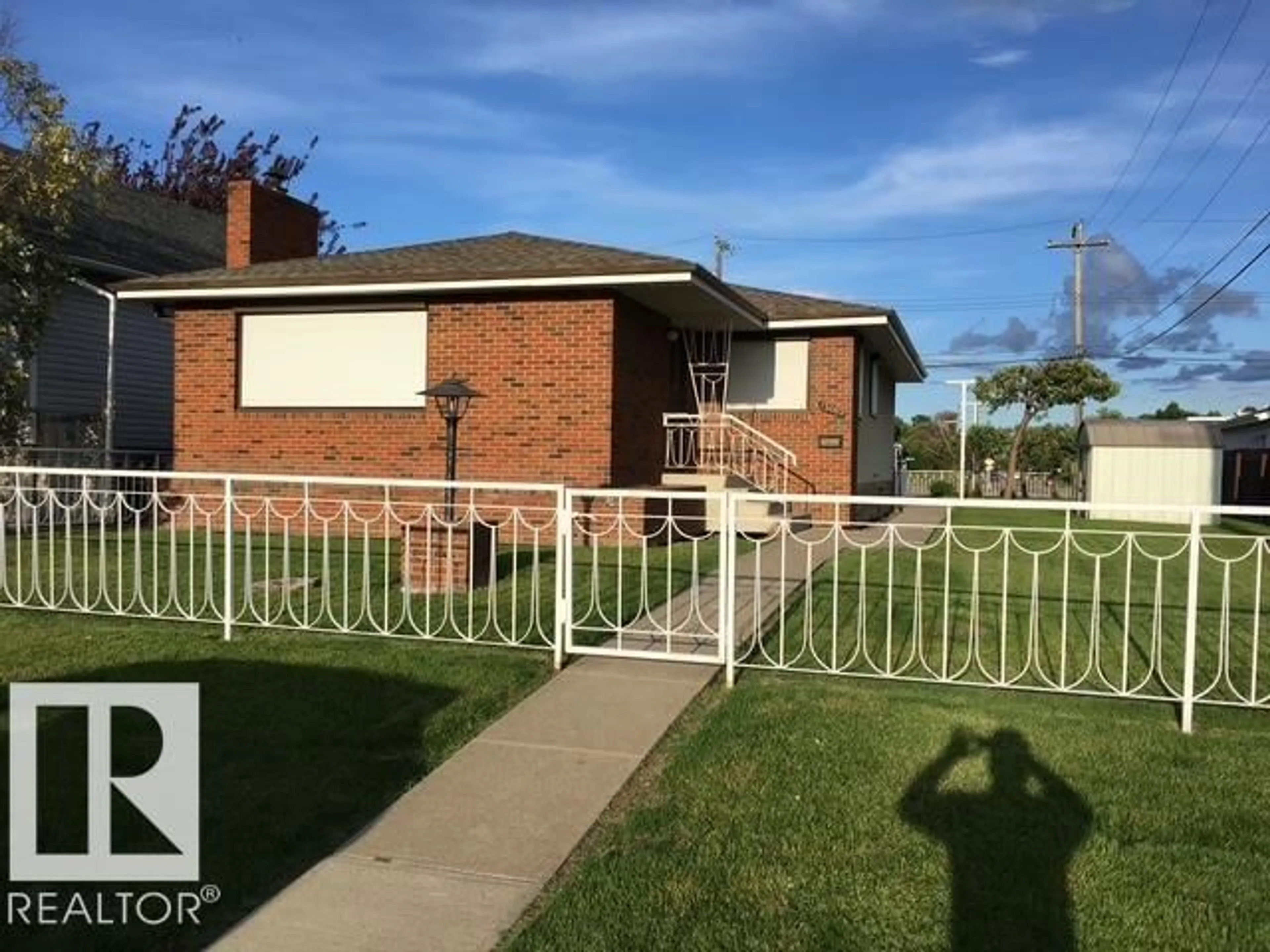 Home with brick exterior material, street for 13003 128 ST, Edmonton Alberta T5L1E6