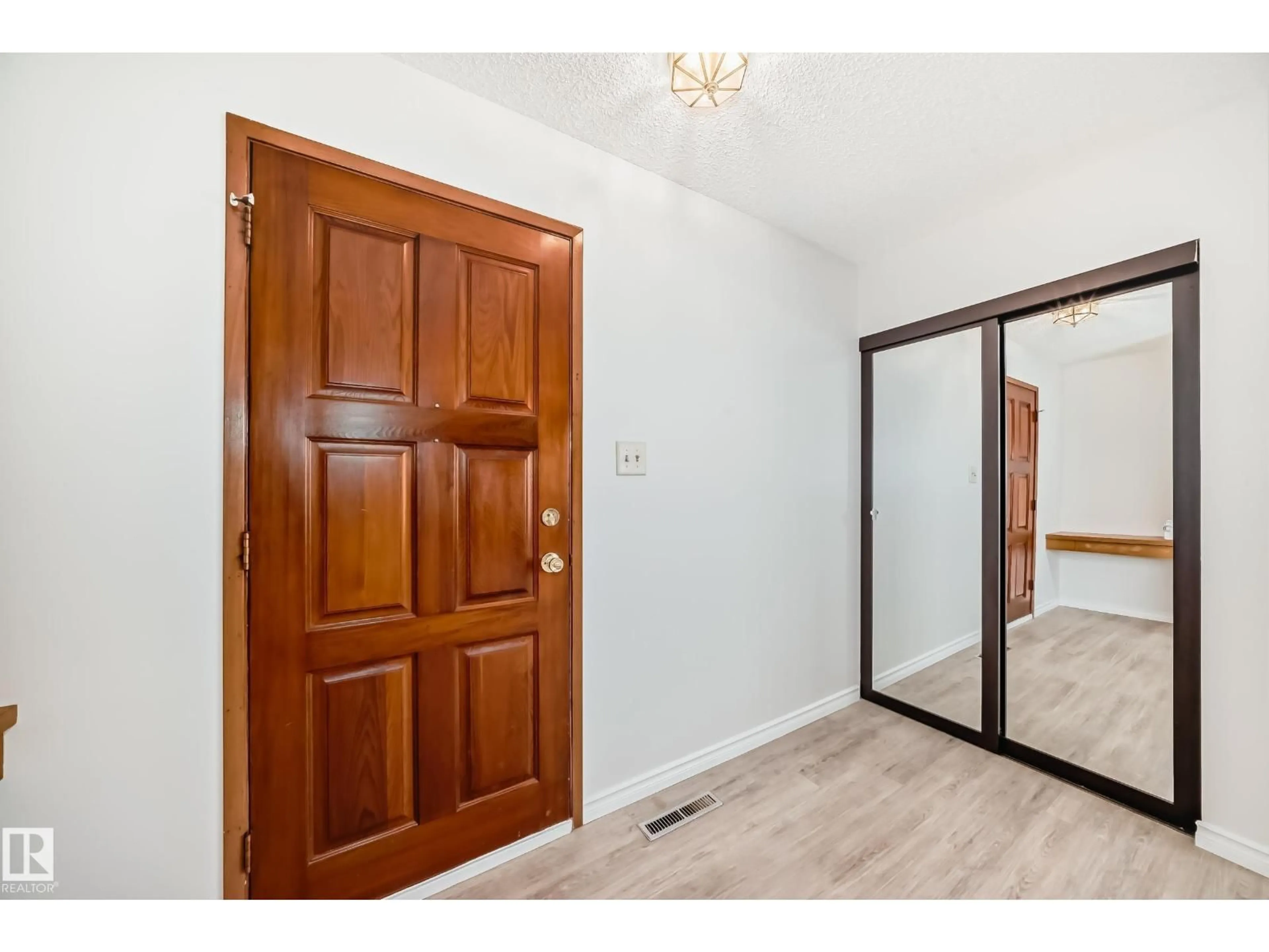 Indoor entryway for 13003 128 ST, Edmonton Alberta T5L1E6