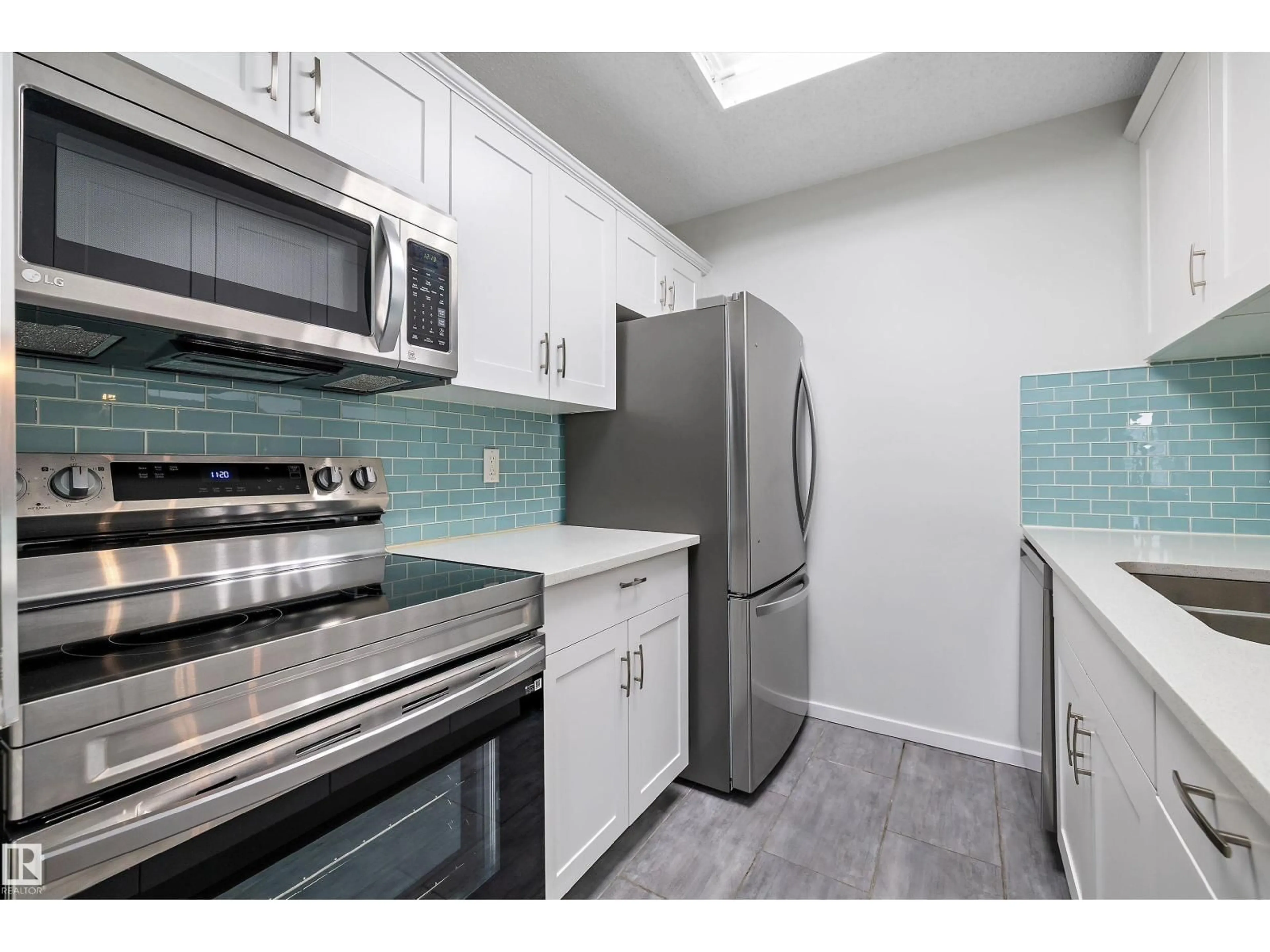 Standard kitchen, ceramic/tile floor for #422 - 6720 158 AV, Edmonton Alberta T5Z3B1