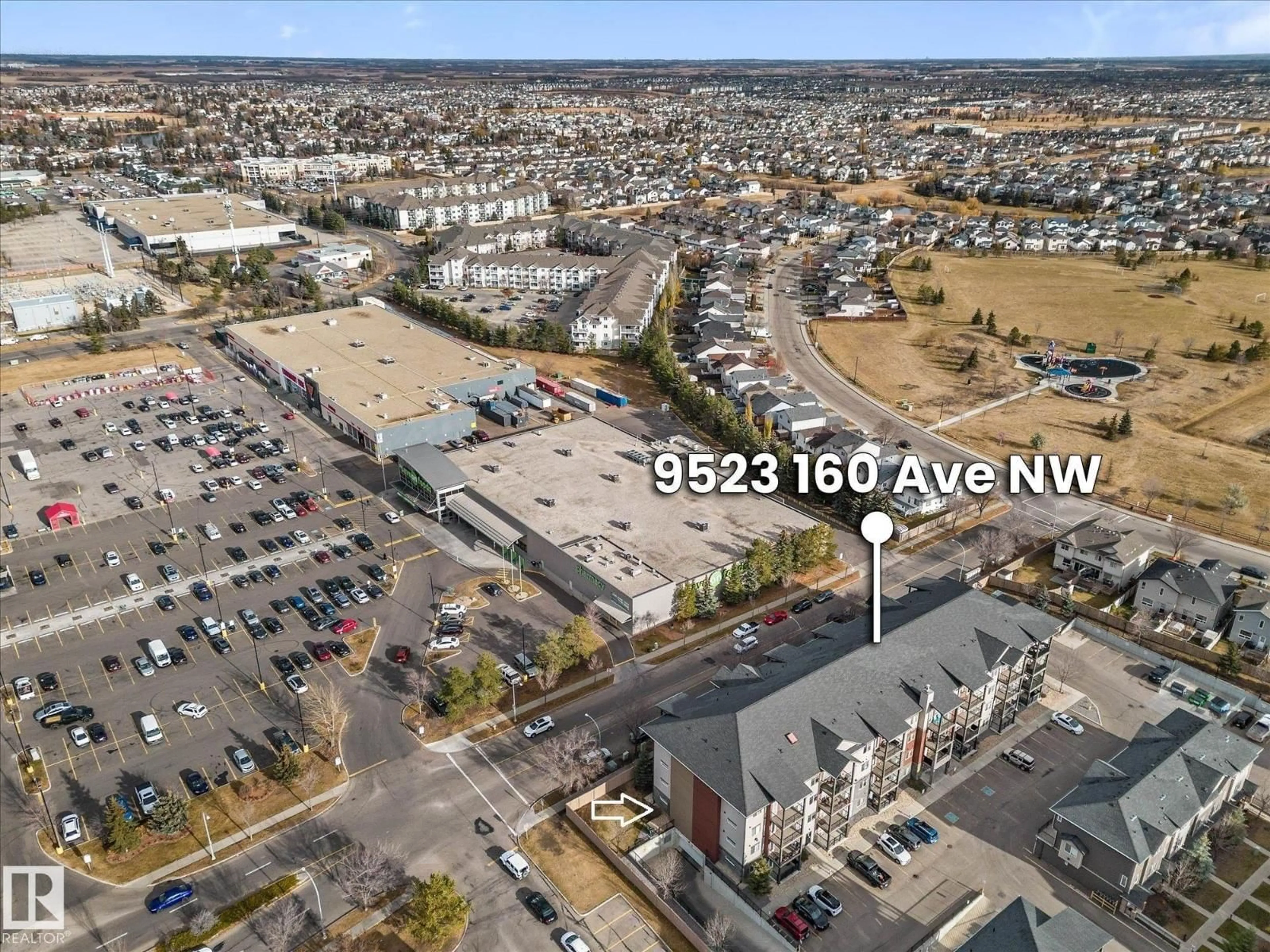 A pic from outside/outdoor area/front of a property/back of a property/a pic from drone, unknown for 9523 - 109 160 AV, Edmonton Alberta T5Z0N1