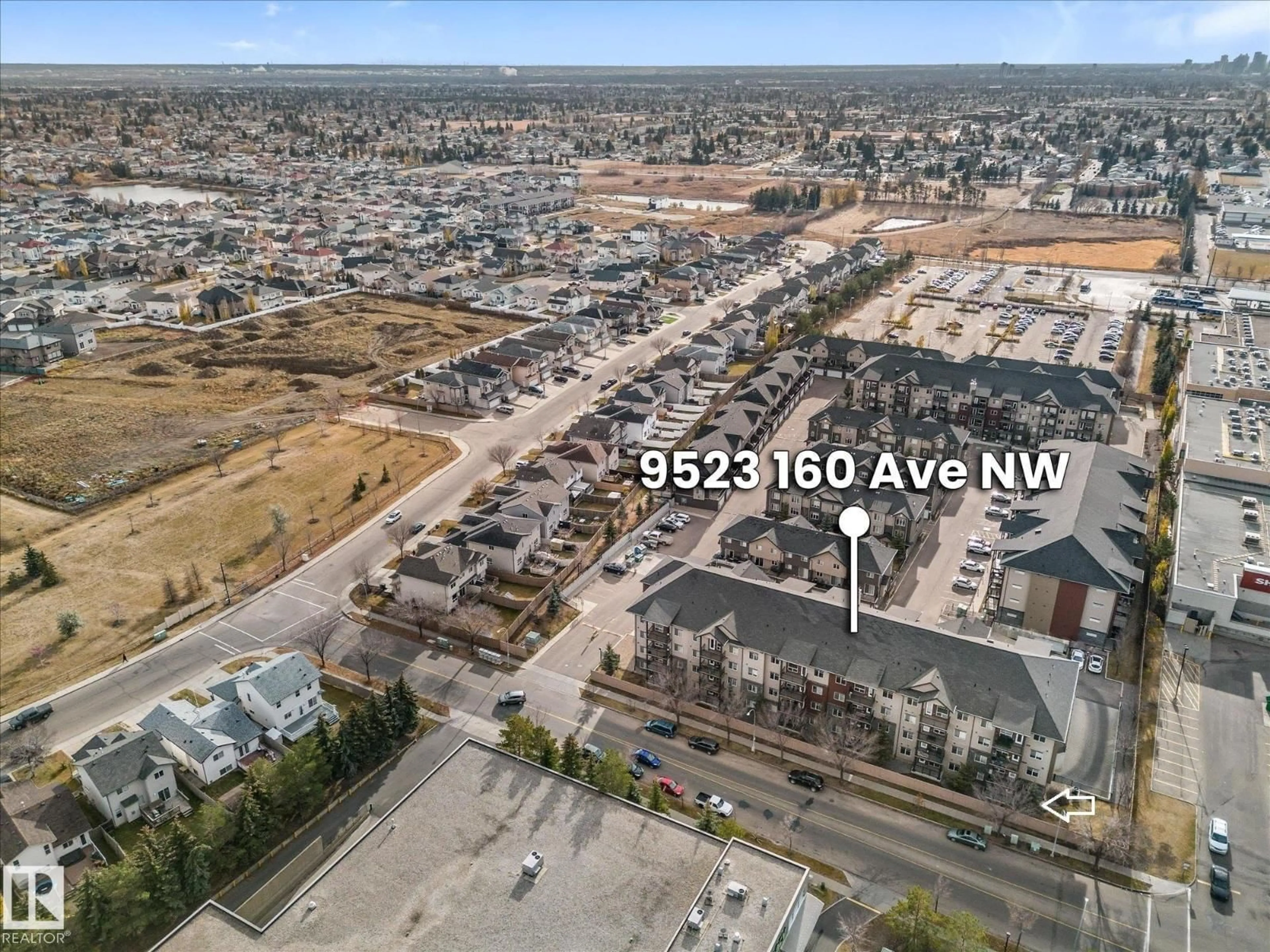 A pic from outside/outdoor area/front of a property/back of a property/a pic from drone, street for 9523 - 109 160 AV, Edmonton Alberta T5Z0N1