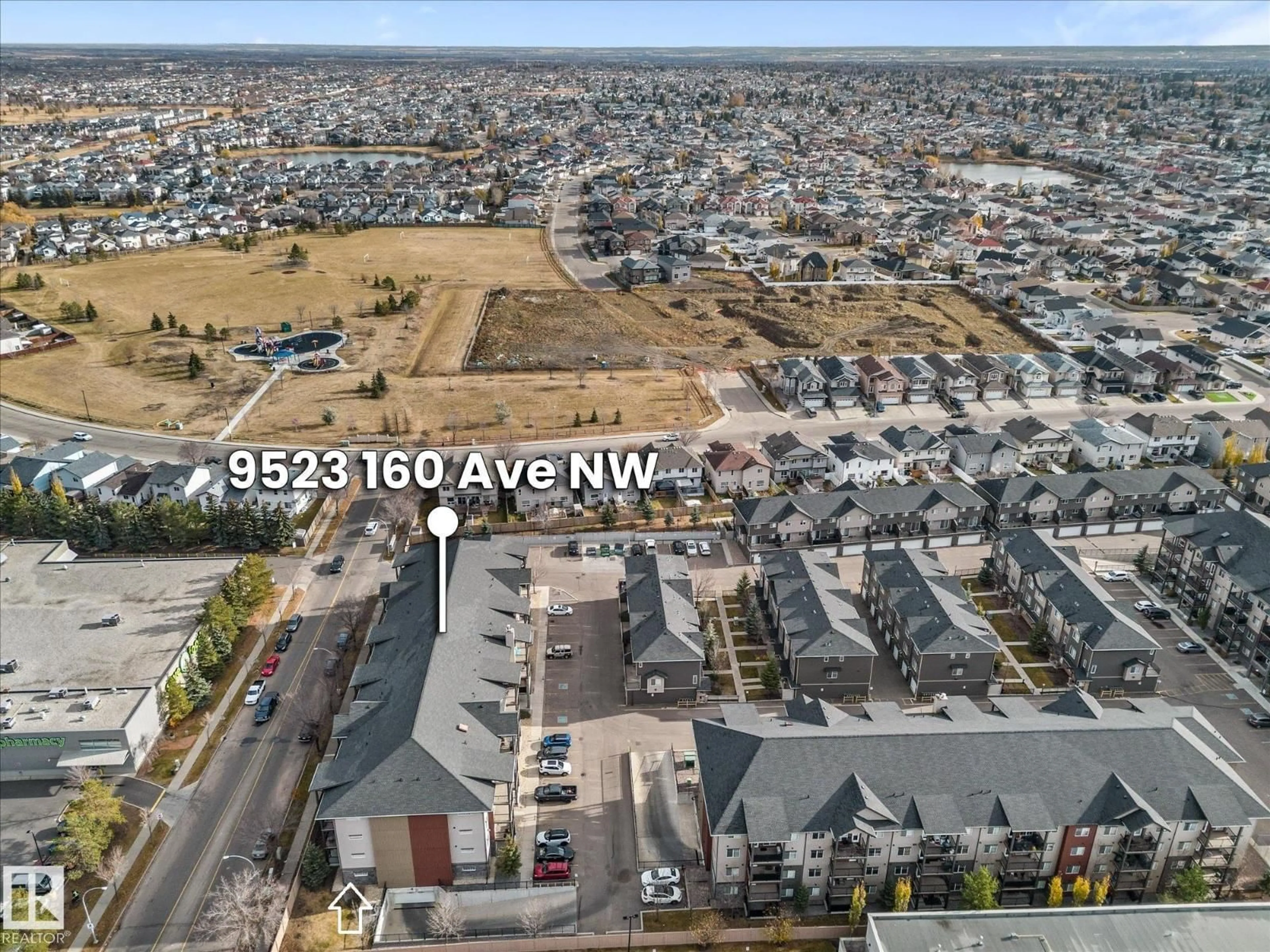 A pic from outside/outdoor area/front of a property/back of a property/a pic from drone, unknown for 9523 - 109 160 AV, Edmonton Alberta T5Z0N1