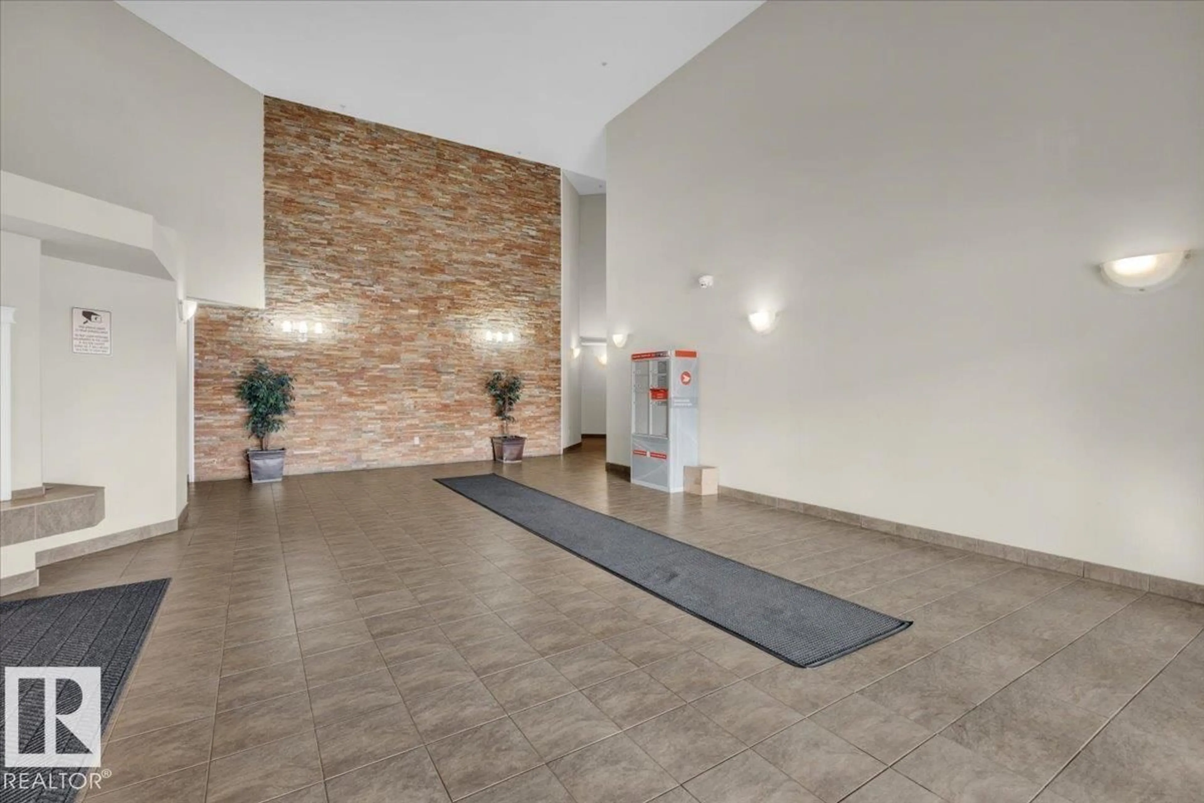 Indoor foyer for #122 - 5350 199 ST, Edmonton Alberta T6M0A4