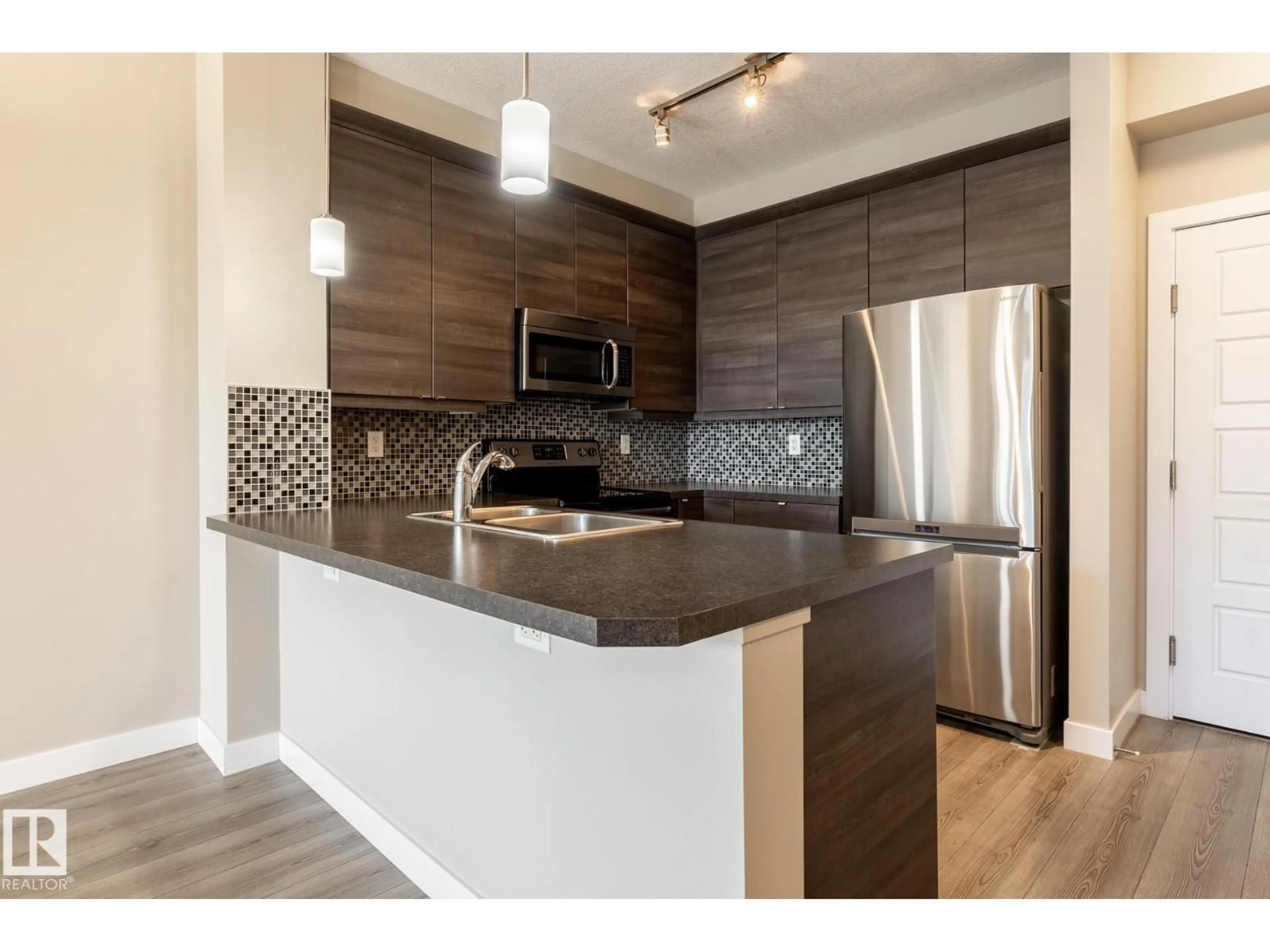 Open concept kitchen, unknown for #203 - 2590 ANDERSON WY, Edmonton Alberta T6W0R2