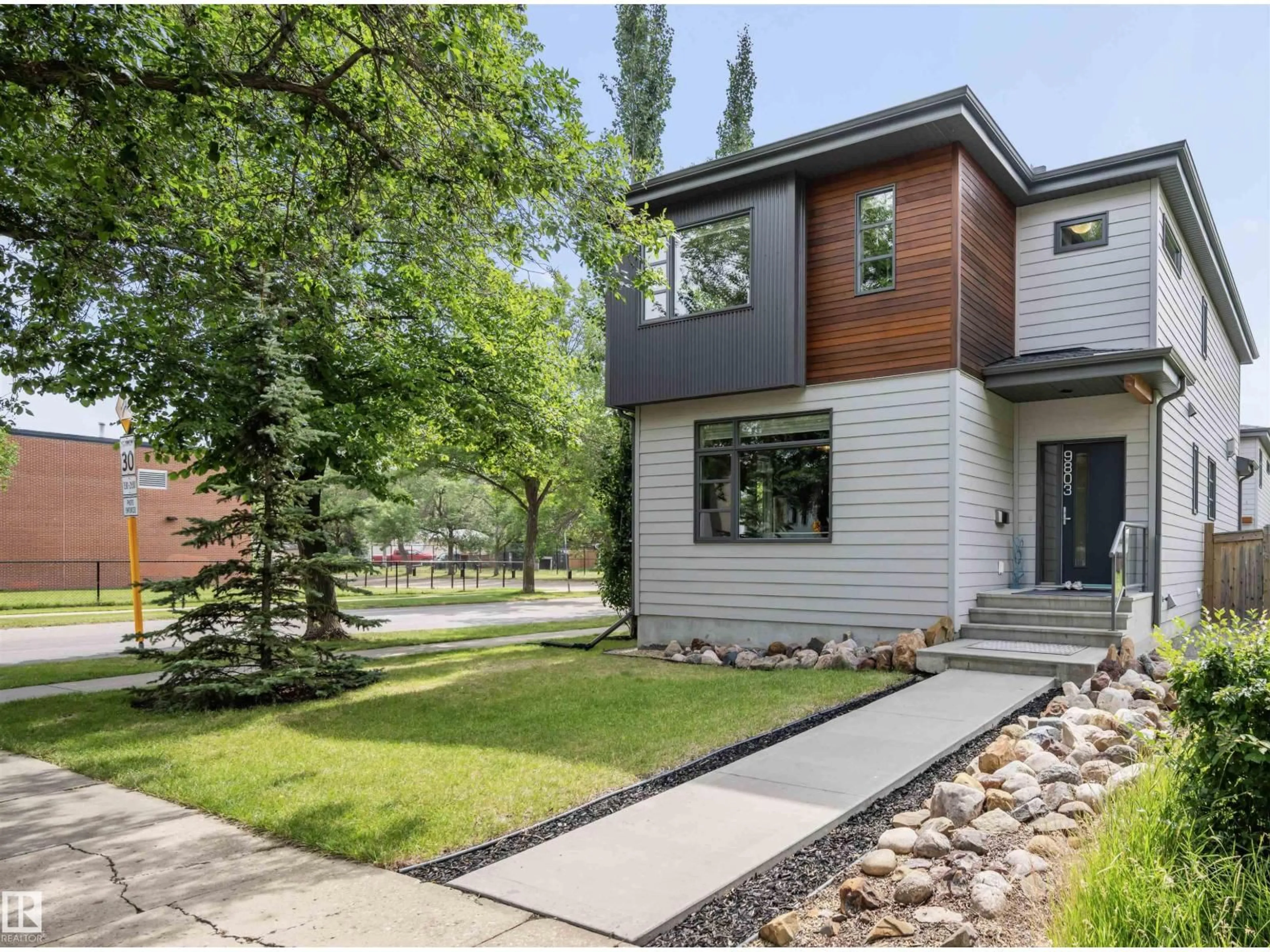 Home with brick exterior material, street for 9803 74 AV, Edmonton Alberta T6E1G1
