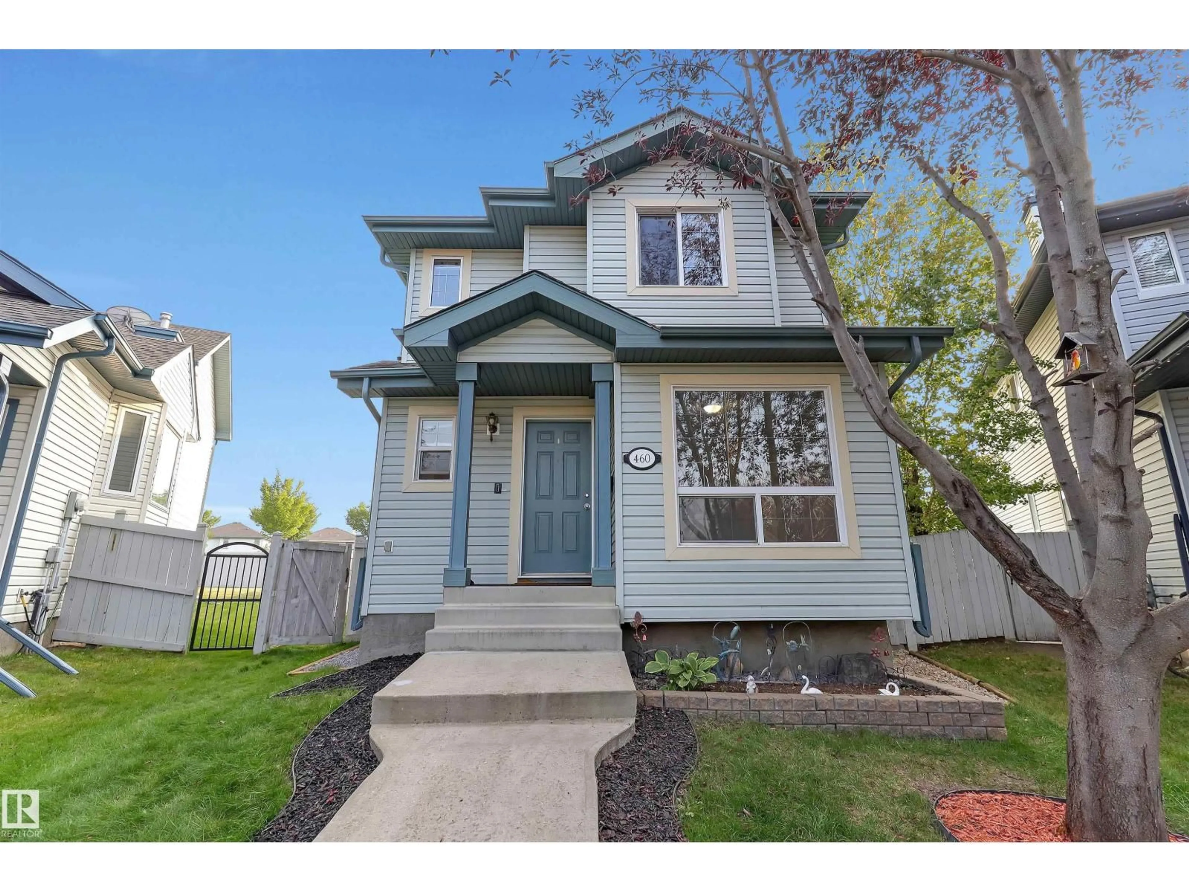 Home with vinyl exterior material, street for NW - 460 GIBB WD, Edmonton Alberta T5T6W7