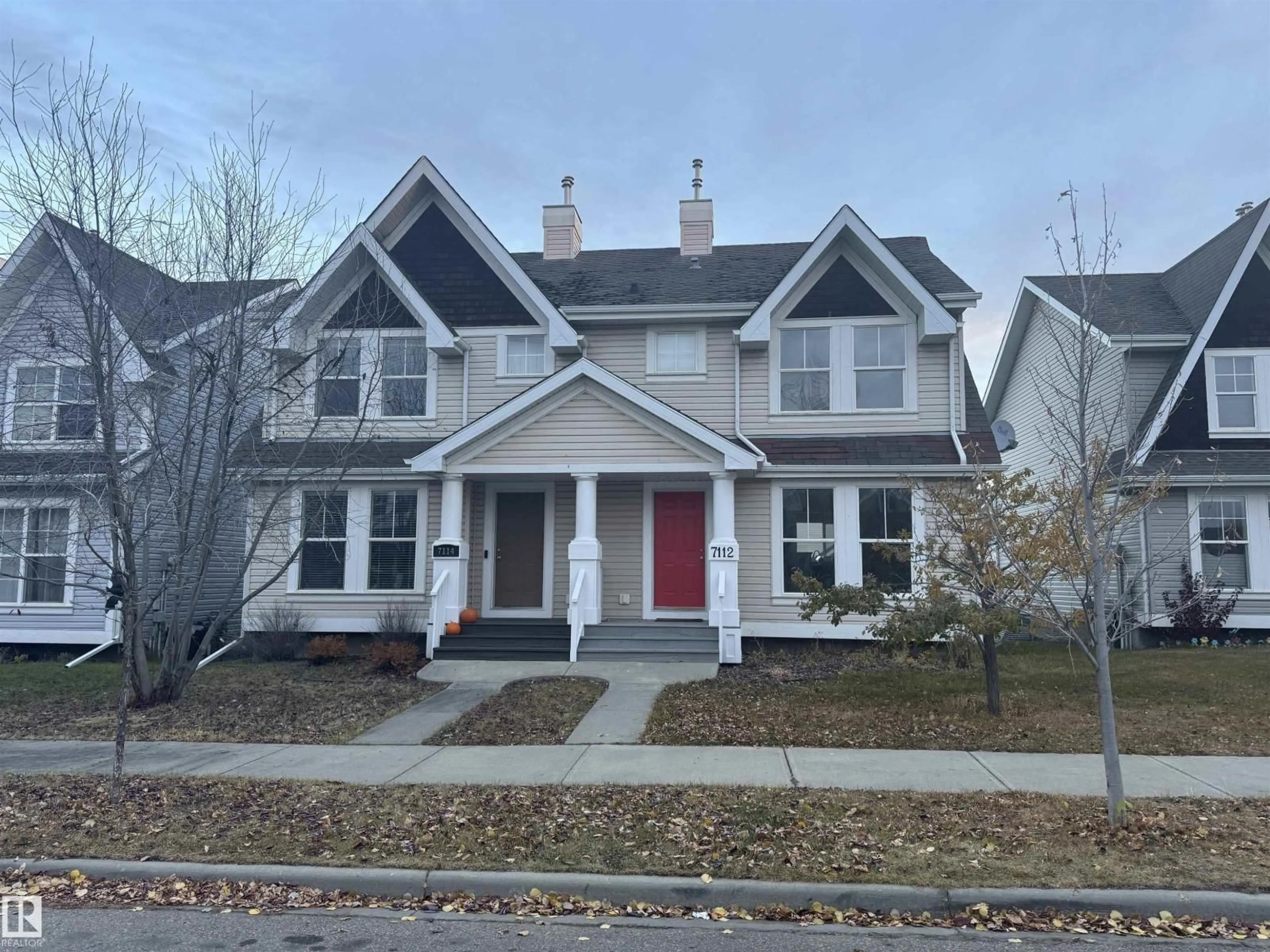 Home with vinyl exterior material, street for 7112 19A AV, Edmonton Alberta T6X0K2