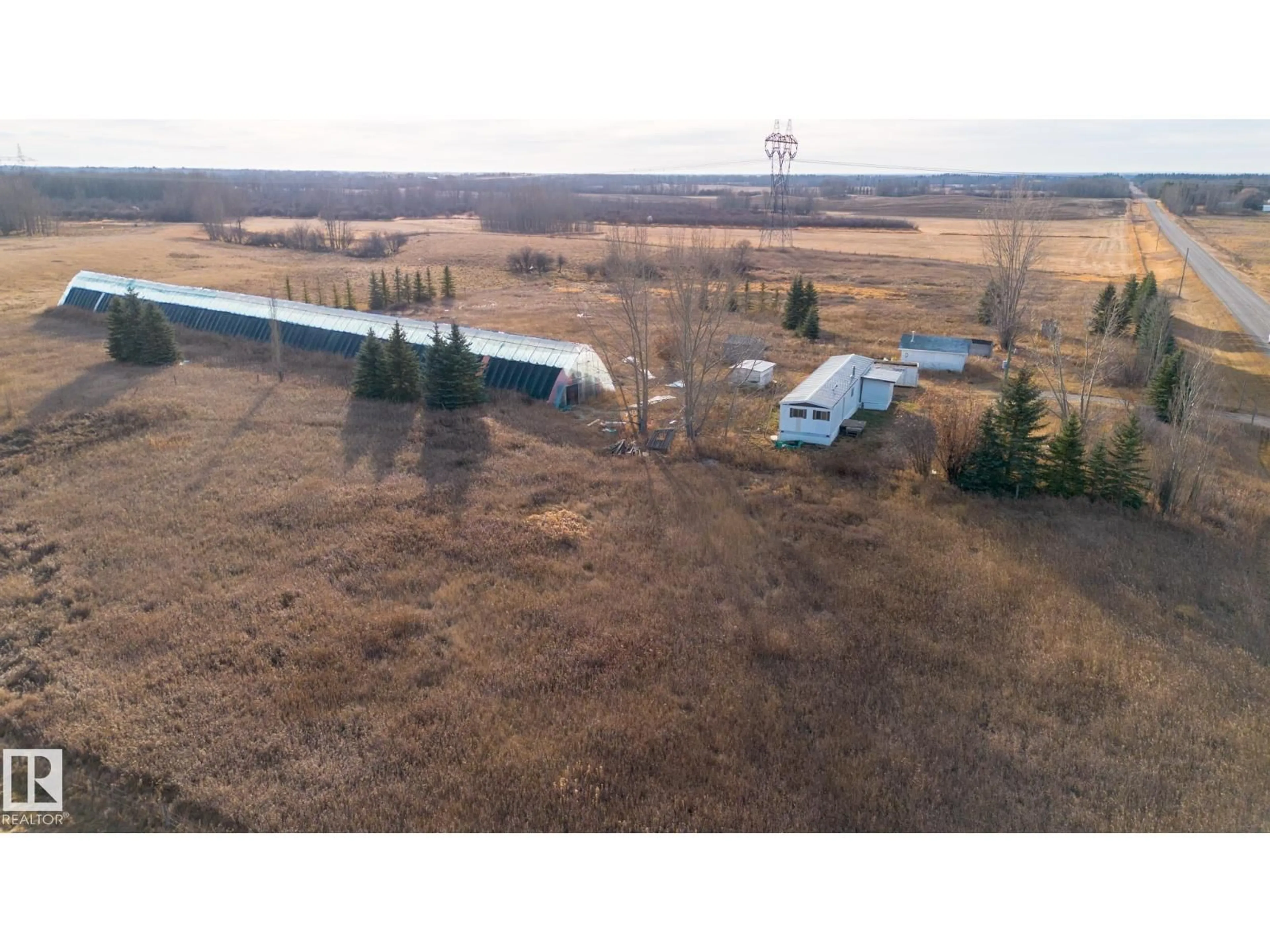 A pic from outside/outdoor area/front of a property/back of a property/a pic from drone, unknown for 51019 RGE ROAD 10, Rural Parkland County Alberta T7Z1X1
