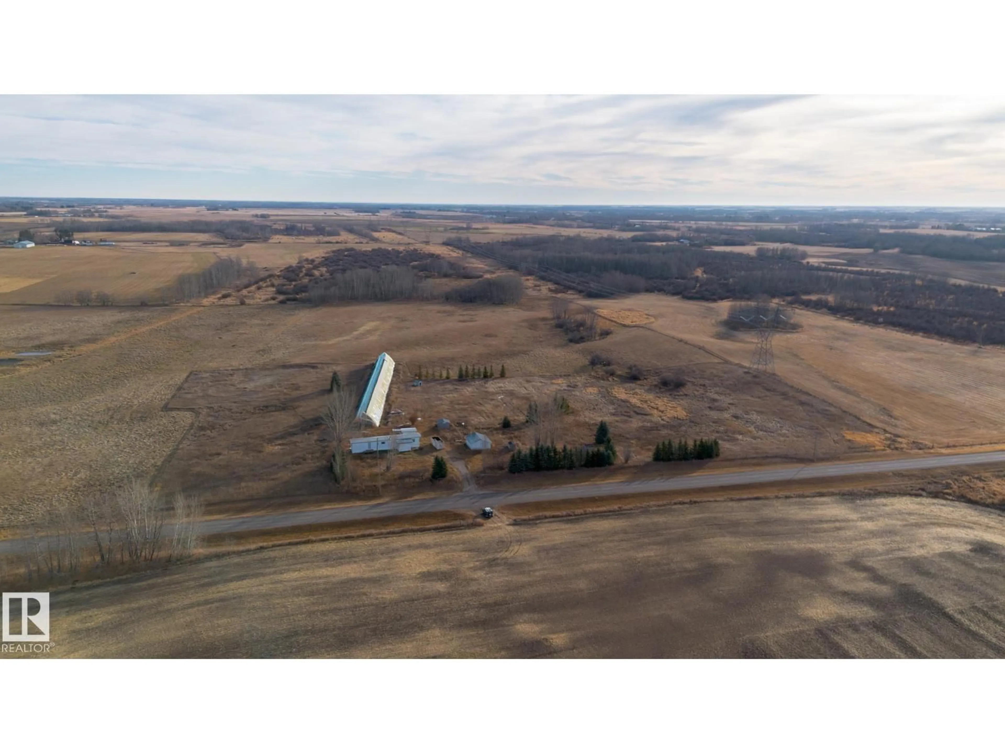 A pic from outside/outdoor area/front of a property/back of a property/a pic from drone, building for 51019 RGE ROAD 10, Rural Parkland County Alberta T7Z1X1