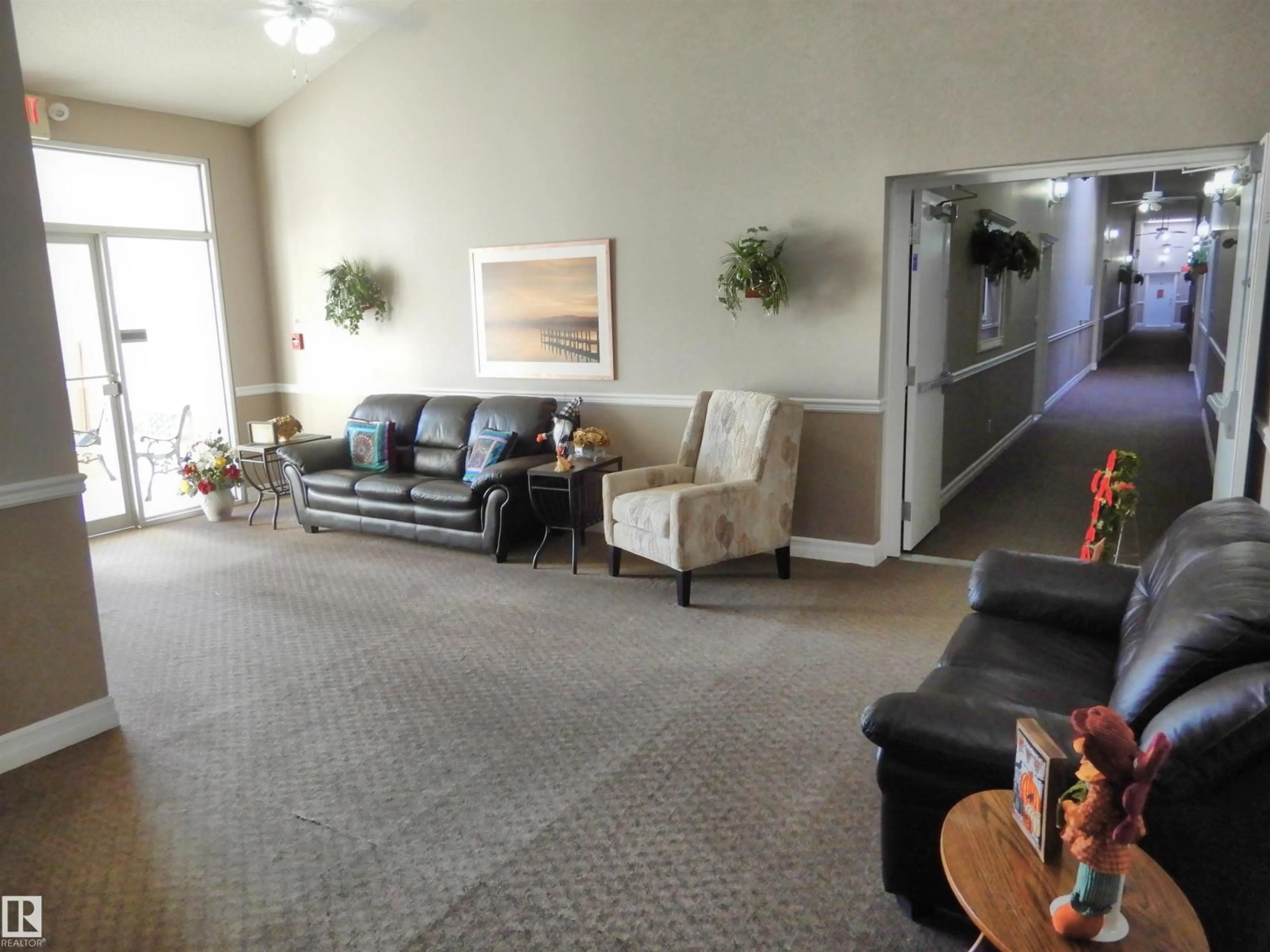 Living room with furniture, carpet floor for 101 - 102 10502, Morinville Alberta T8R1V7