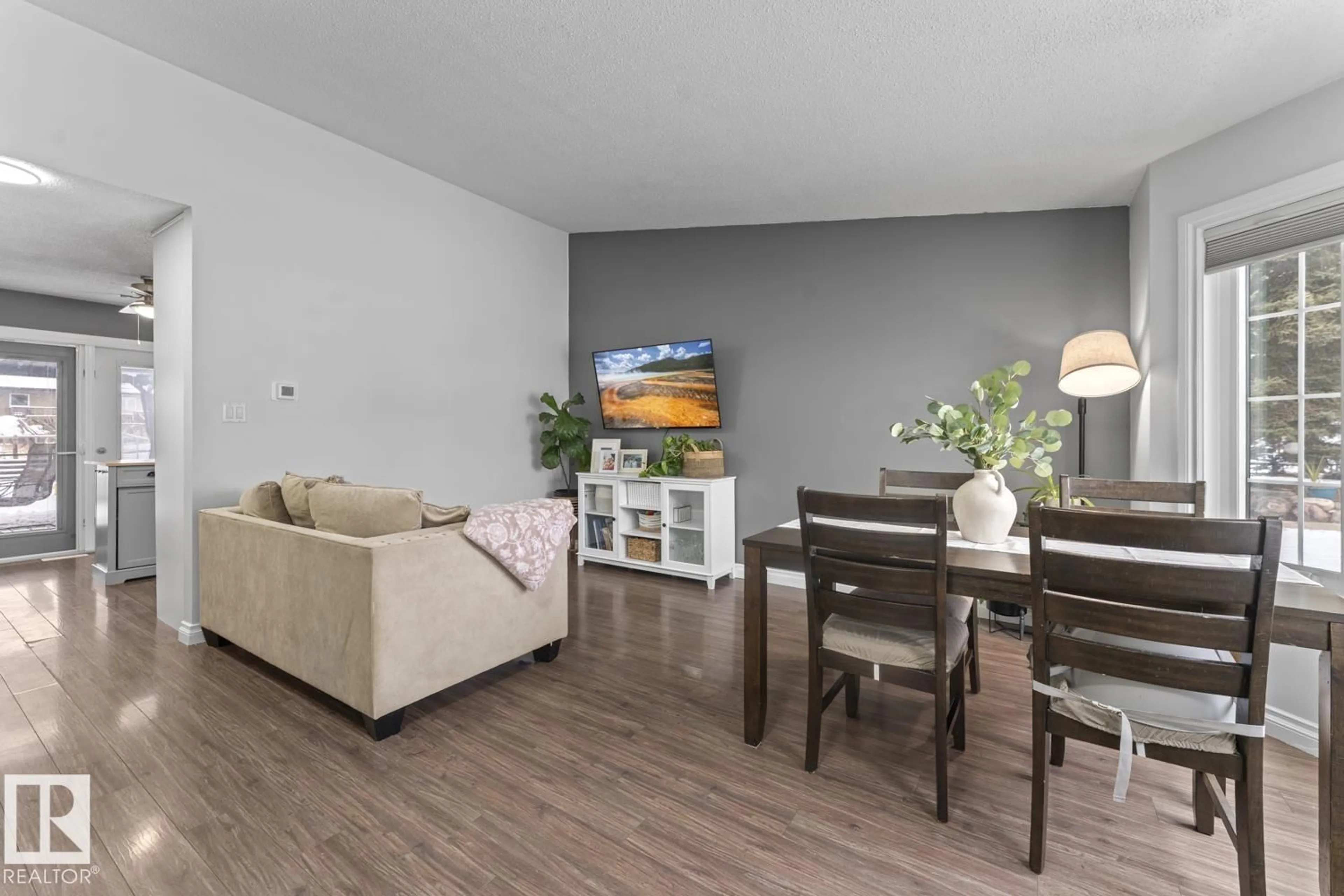 Living room with furniture, wood/laminate floor for 209 22 ST, Cold Lake Alberta T9M0A8